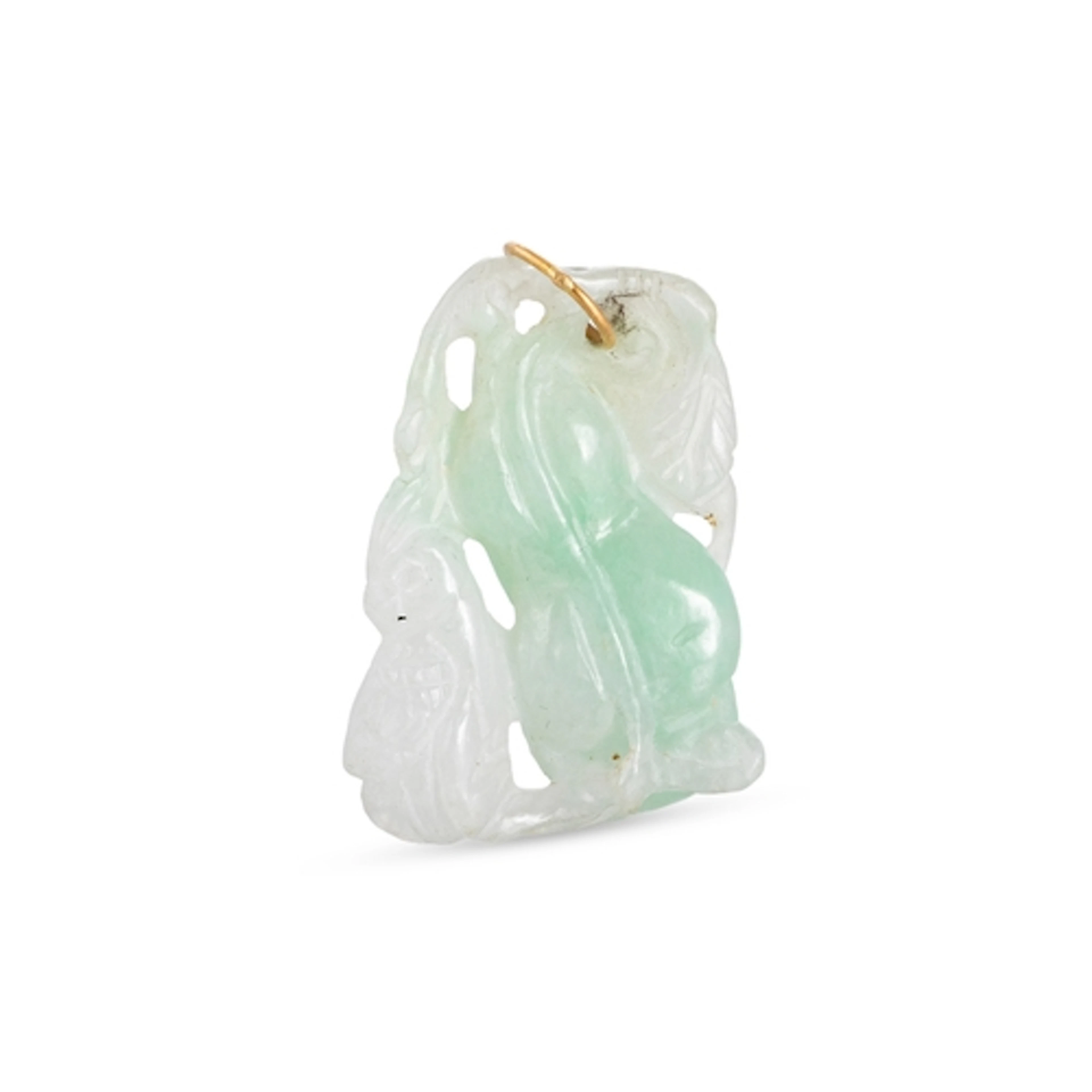 A JADE CARVED PENDANT, to a yellow gold mount
