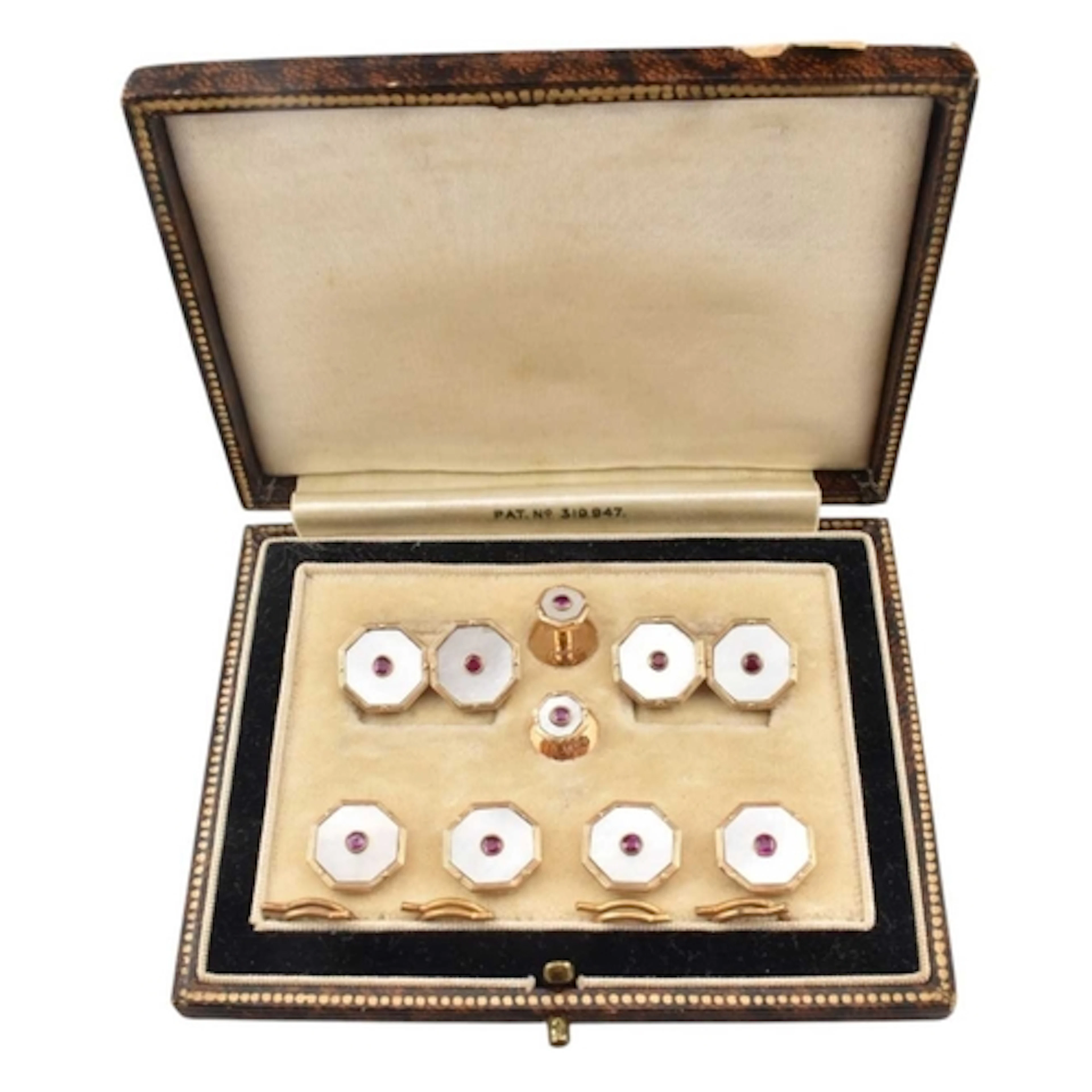 A 1950s cased hallmarked 9ct gold mother of pearl and ruby b...