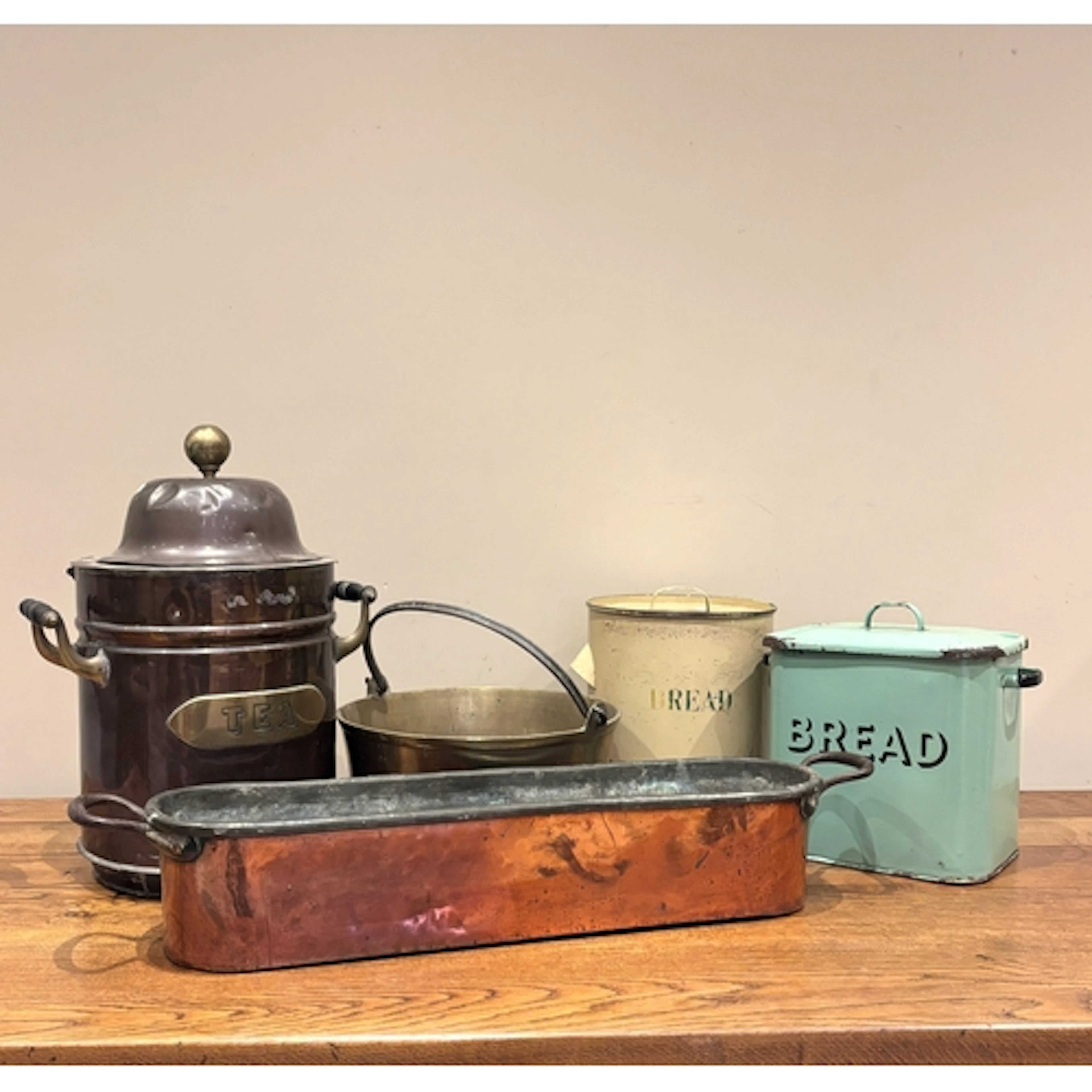 A green enamel bread bin and cover, of rounded rectangular f...