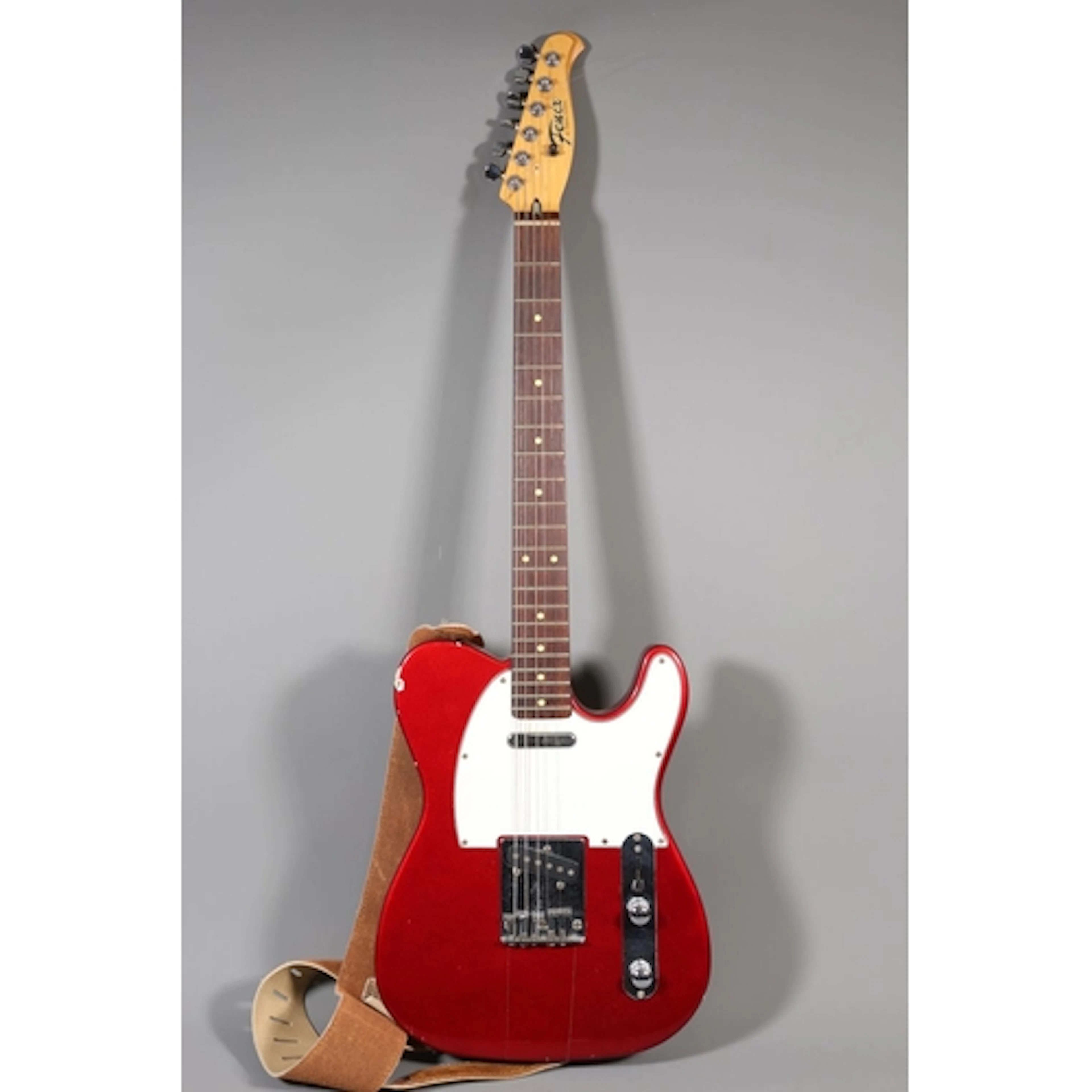 Fenix by Young Chang six string electric guitar with red and...