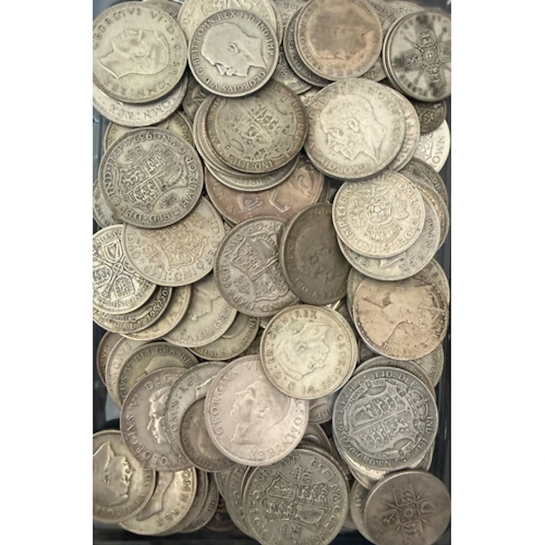 A collection of circulated UK pre-1947 silver coins, denomin...