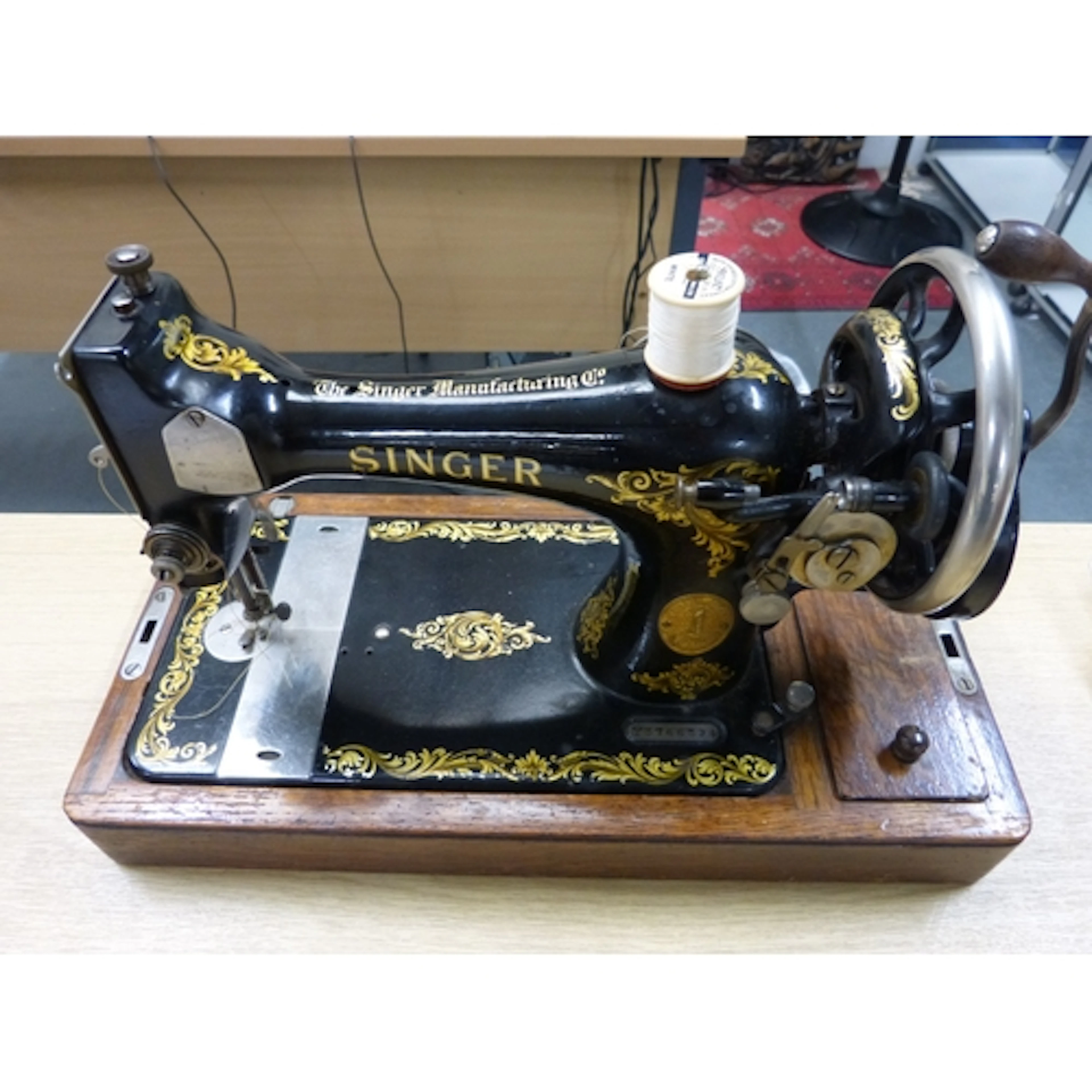 Vintage cased Singer sewing machine.
