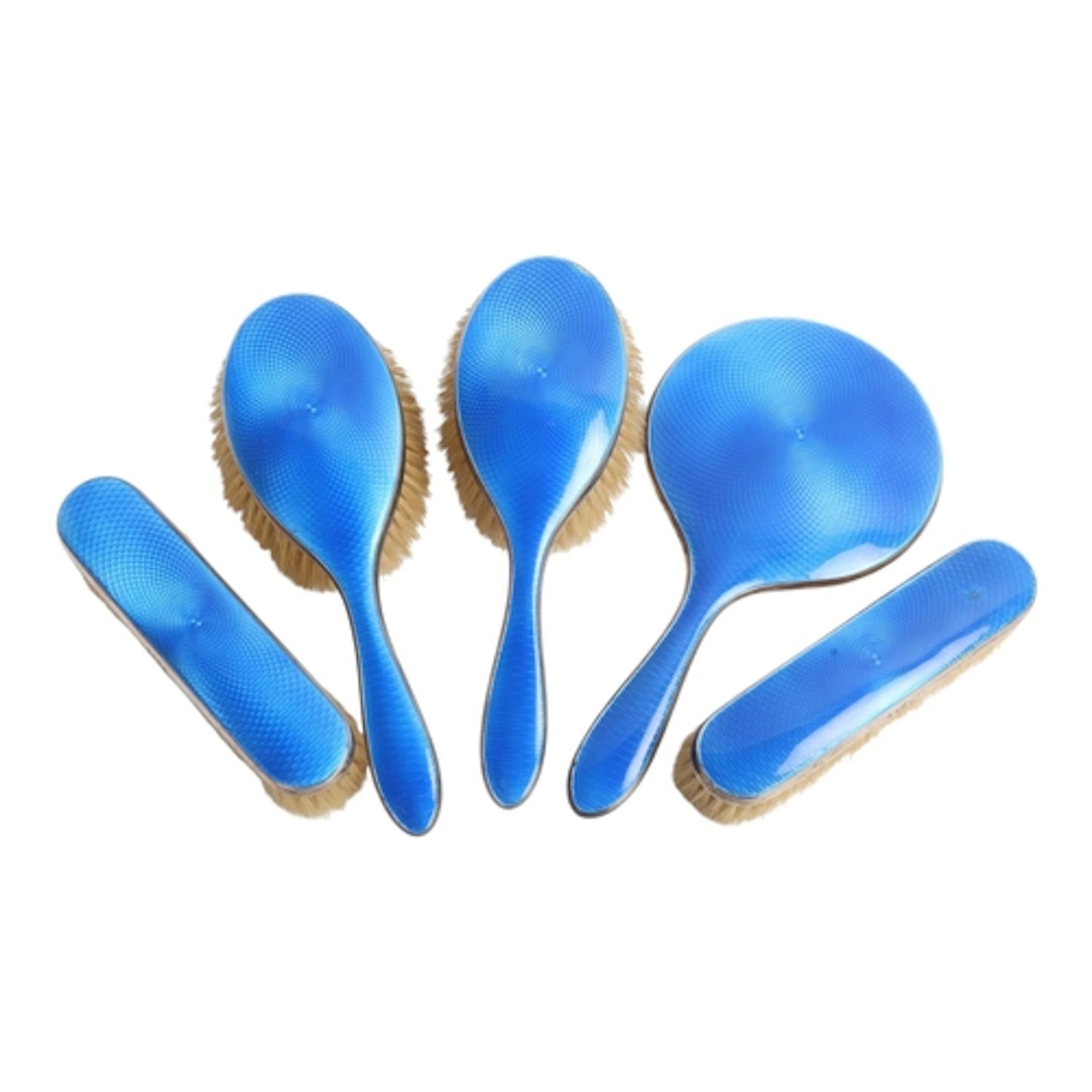 An Art Deco George V silver and blue enamel 5-piece dressing...
