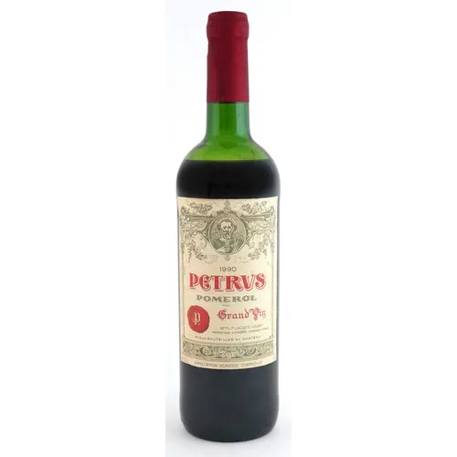 Bottle of 1990 Petrus Pomerol Grand Vin red wine.