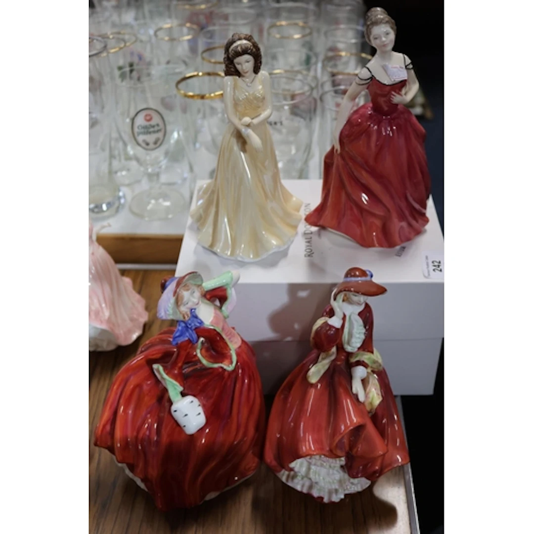 Four Royal Doulton figurines to include June Pearl, Autumn L...