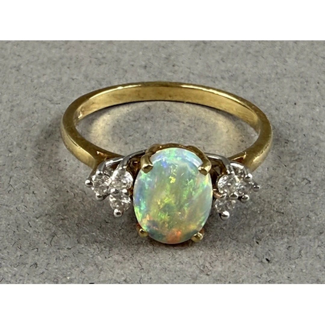 Jewellery- H/M 18ct gold oval Opal and diamond cluster ring ...