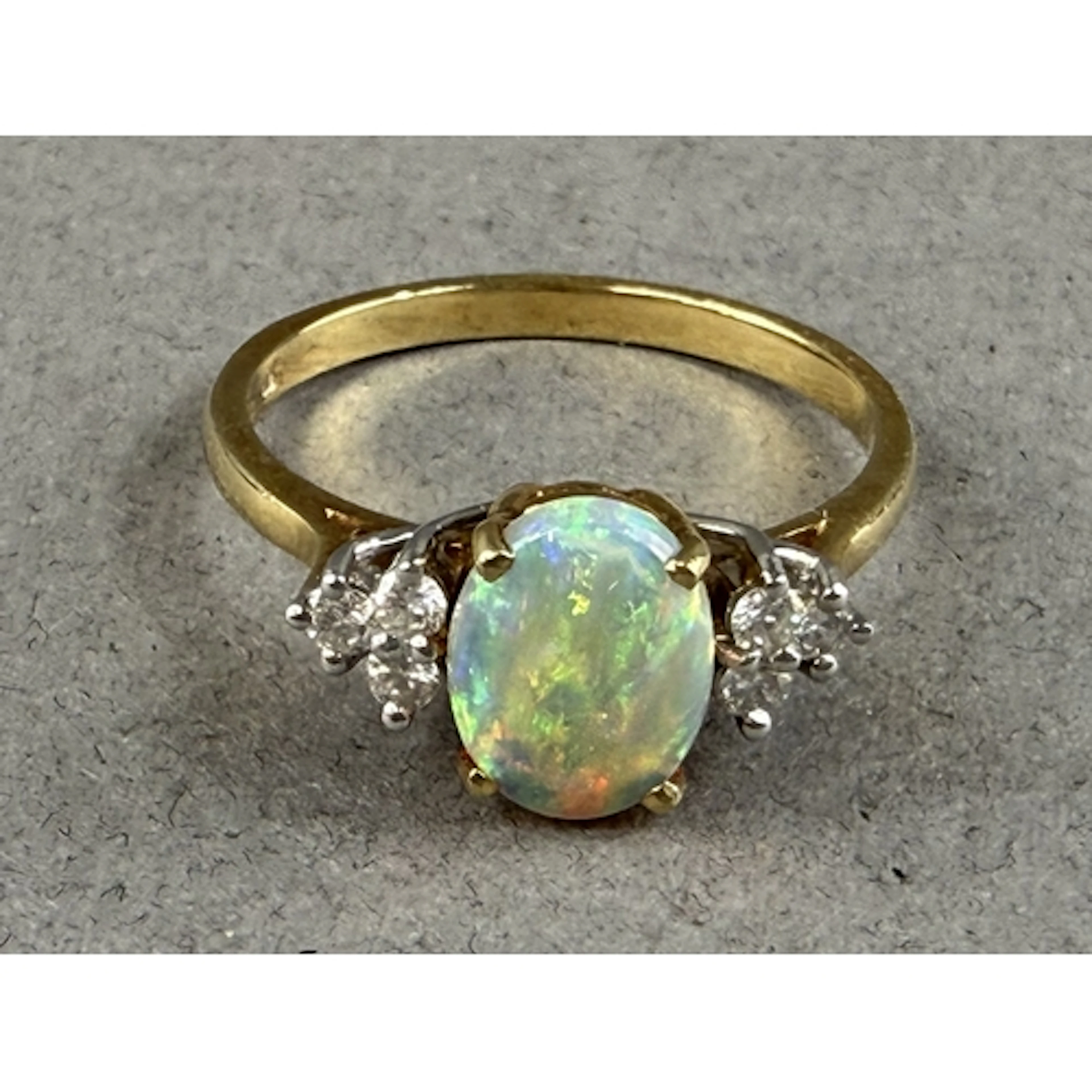 Jewellery- H/M 18ct gold oval Opal and diamond cluster ring ...