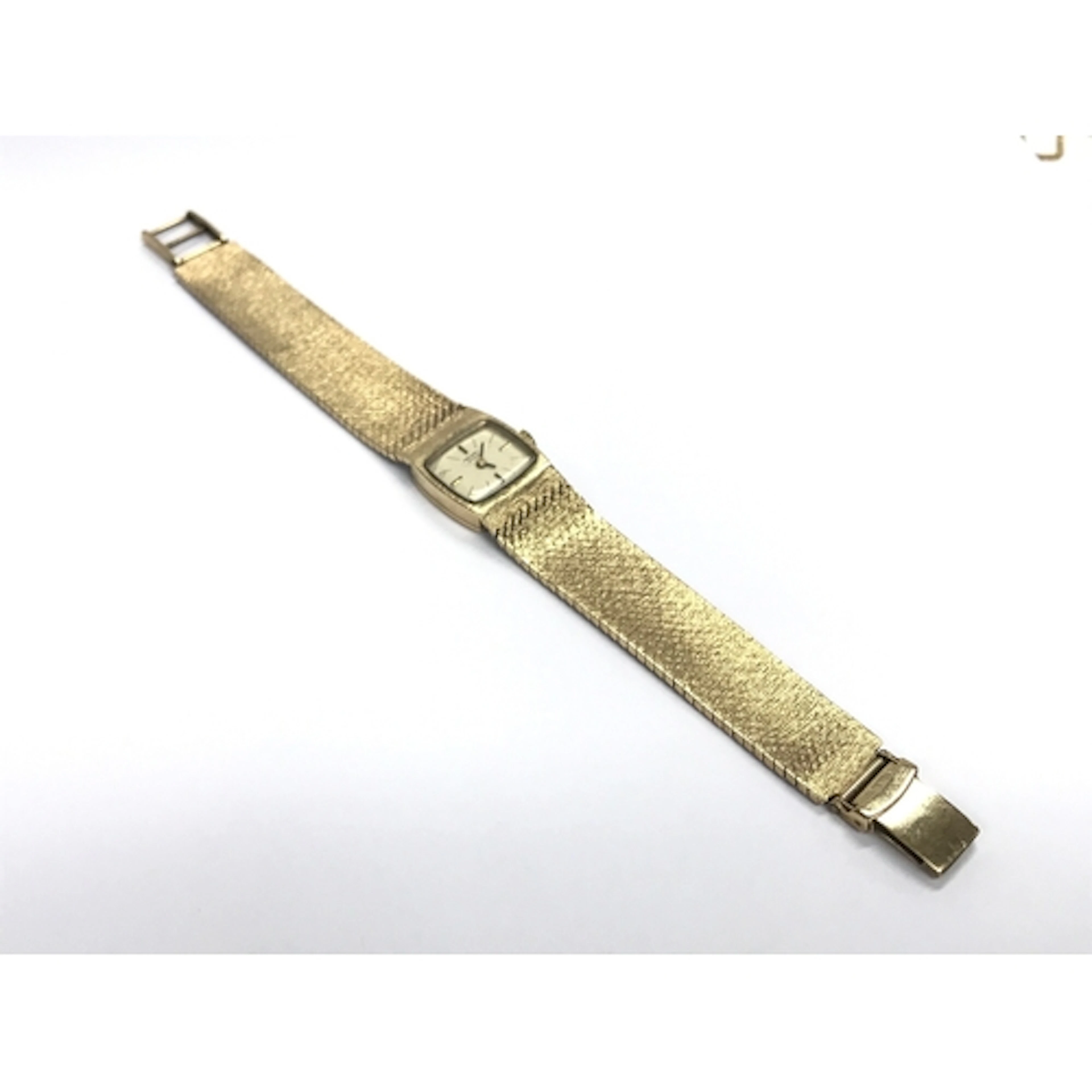 A ladies 9ct gold record de luxe watch with silver dial. 17 ...