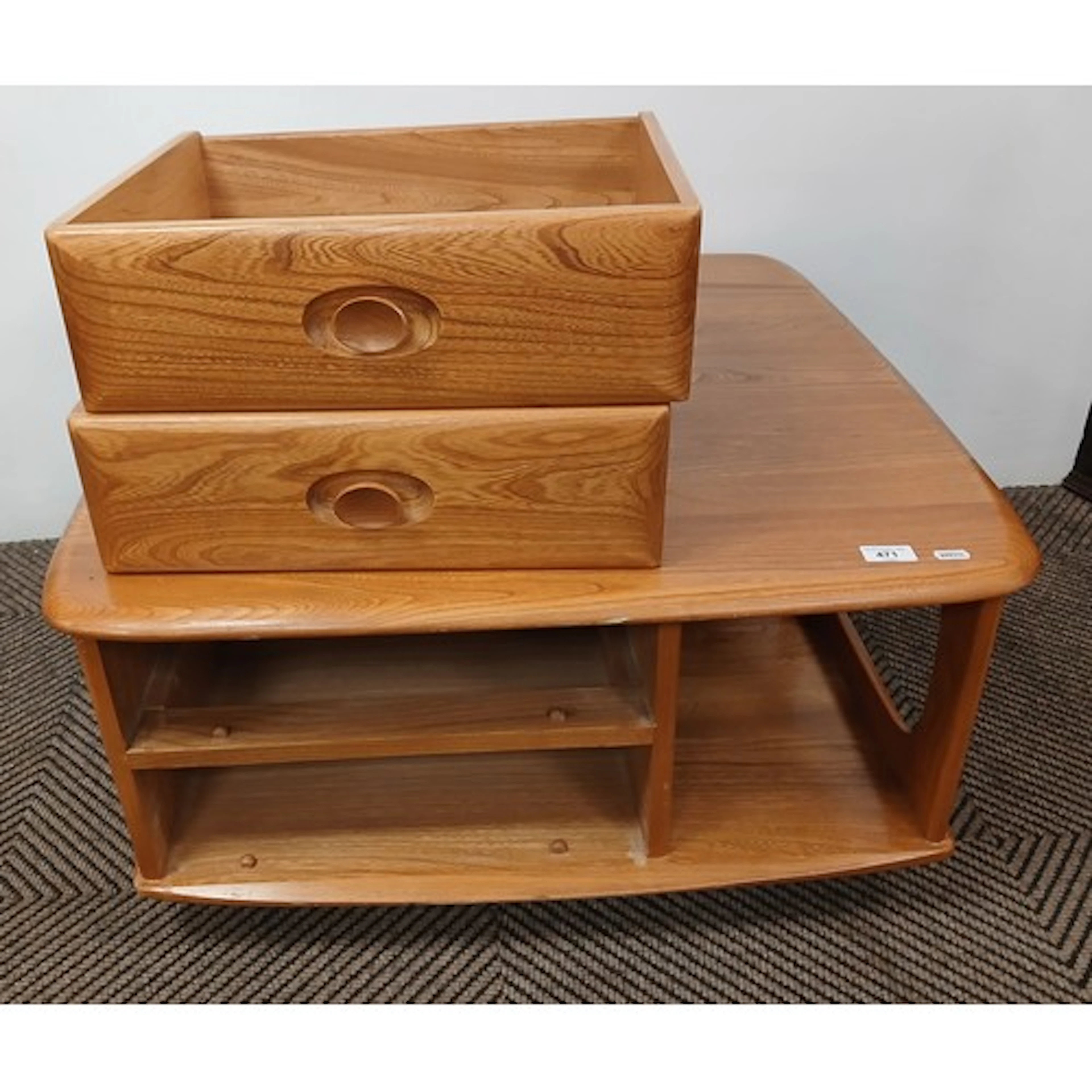 Ercol light oak minerva coffee table.