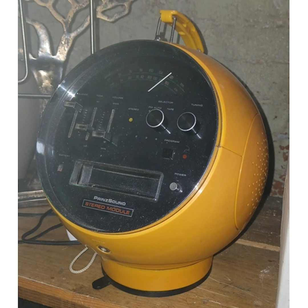 A Prinzsound space helmet 8 track cassette player.