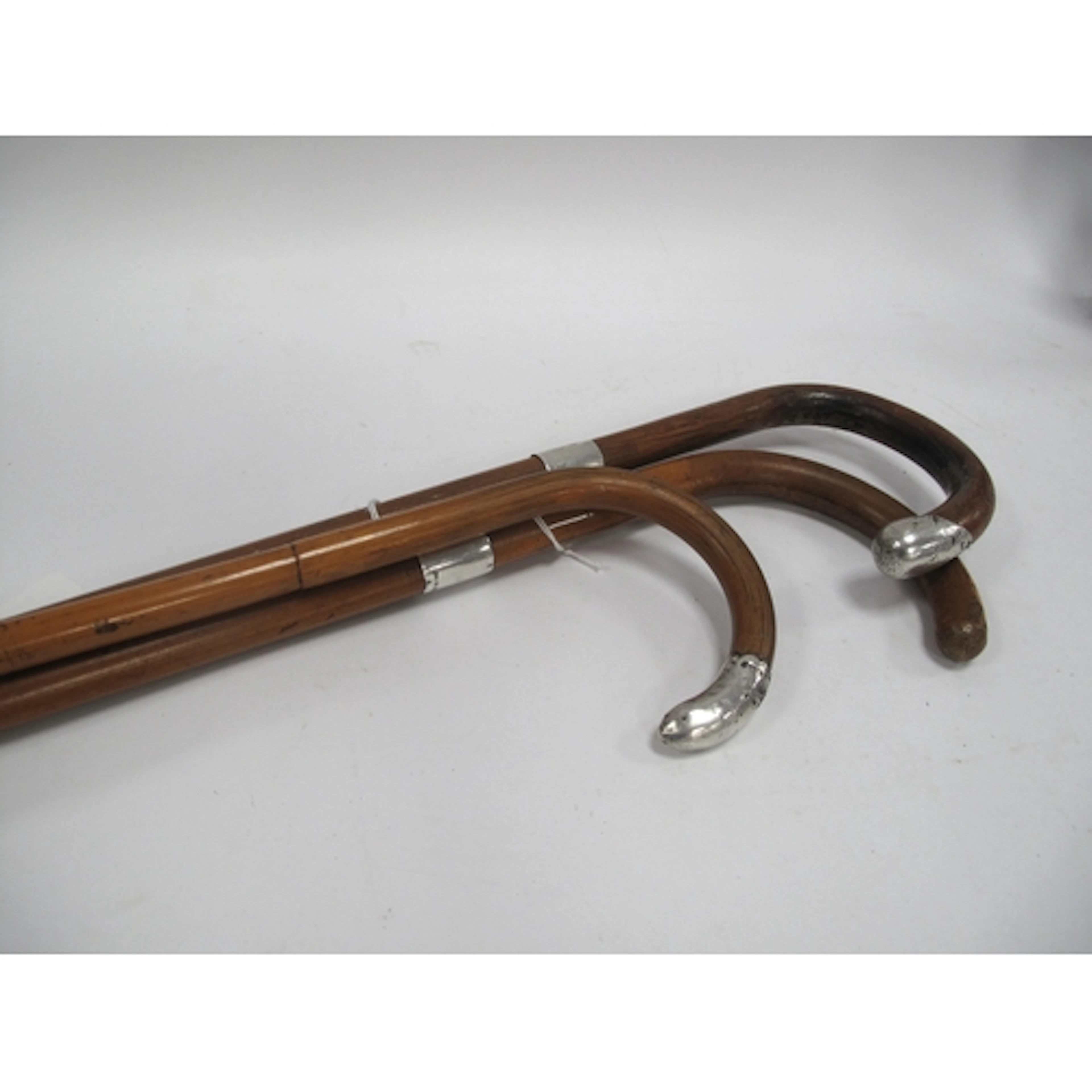 Three Antique Silver-mounted Crook-handle Wooden Walking Sti...