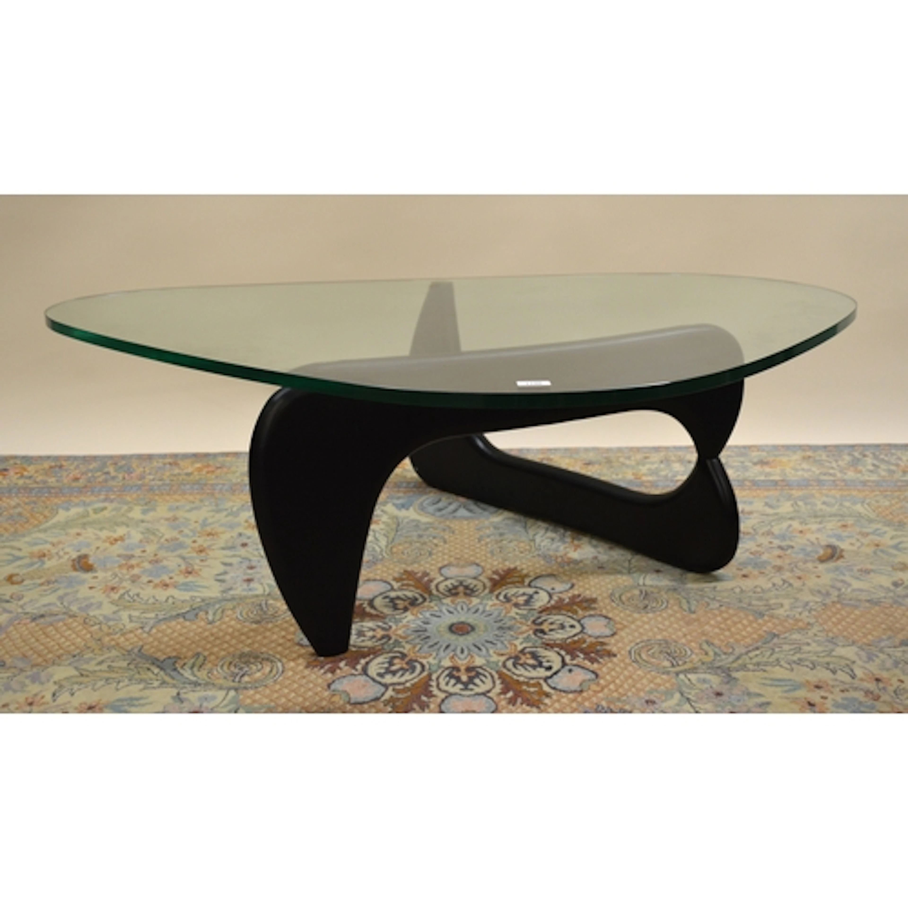 Isamu Noguchi style glass top coffee table with ebonised fol...