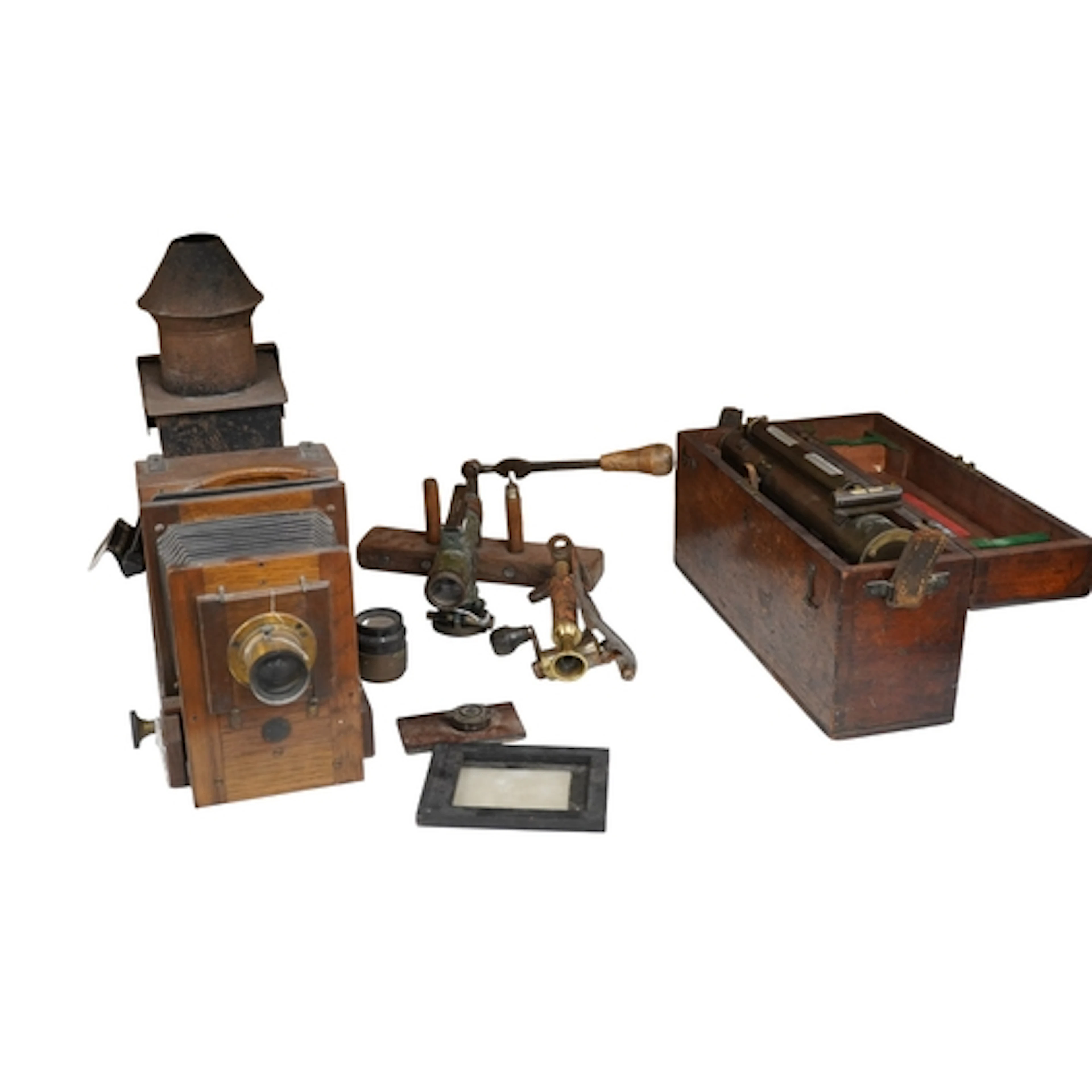 A late 19th century mahogany and tinplate magic lantern styl...