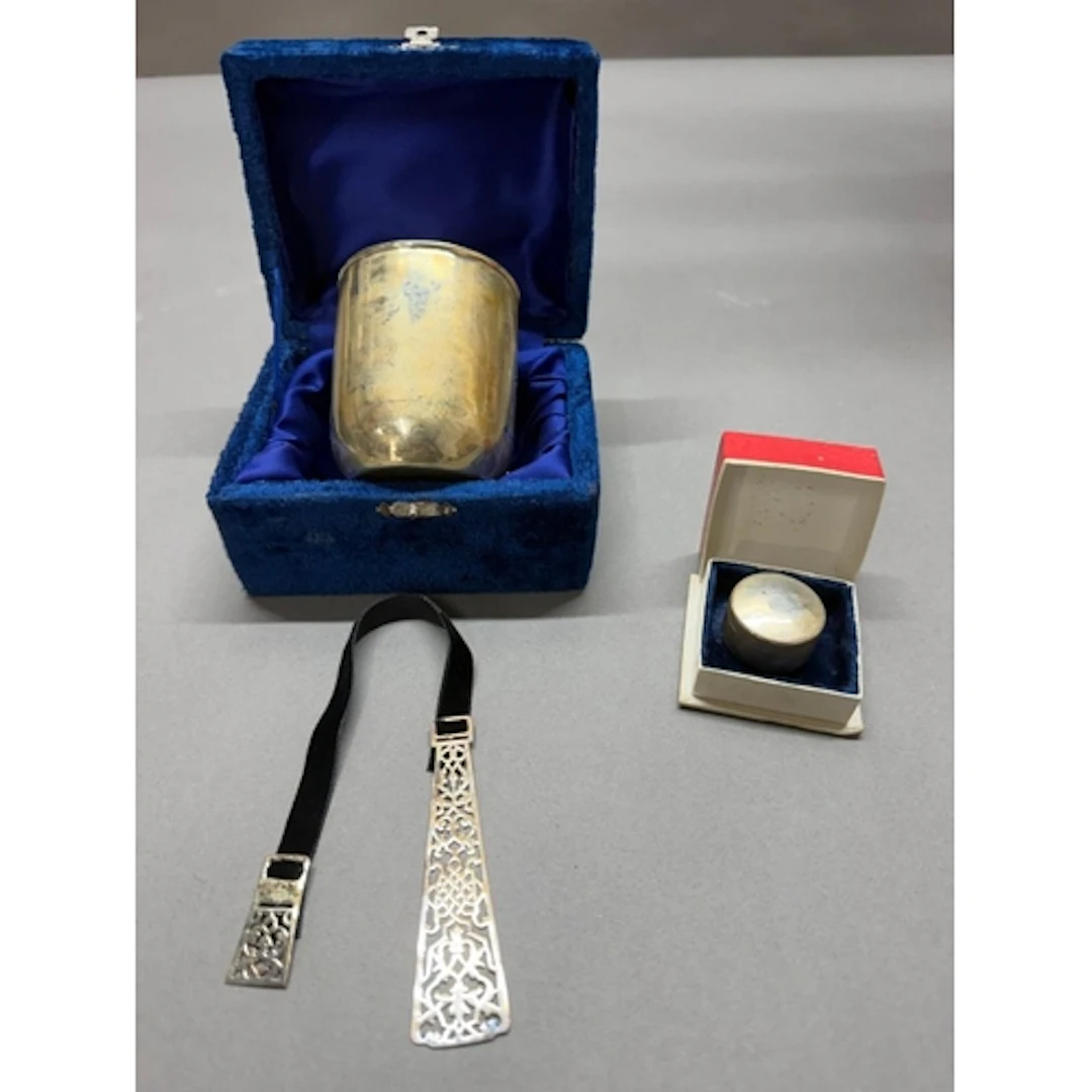 A selection of Pakistani silver to include a beaker, pill po...