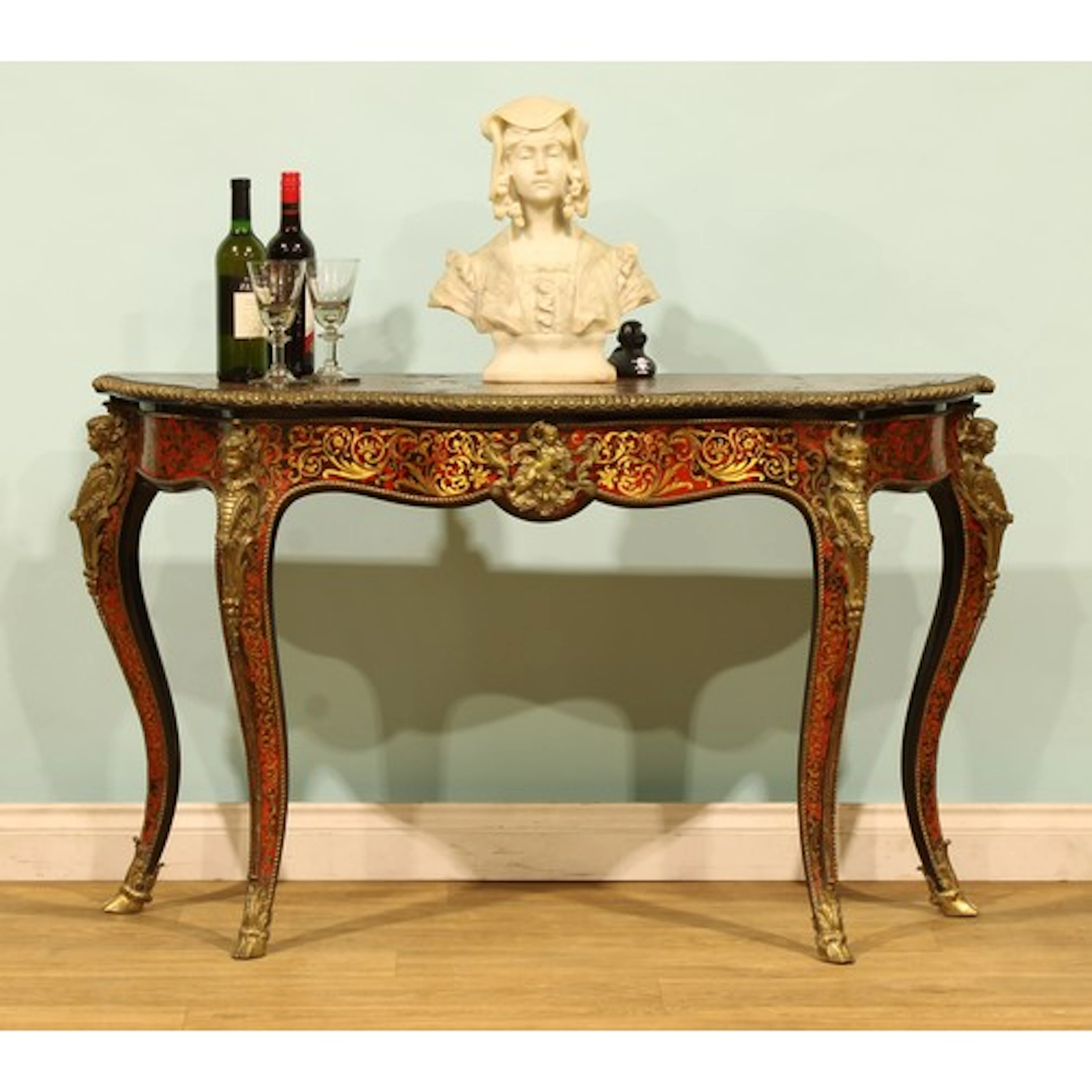 A Louis XV Revival gilt metal mounted, ebonised and premier ...