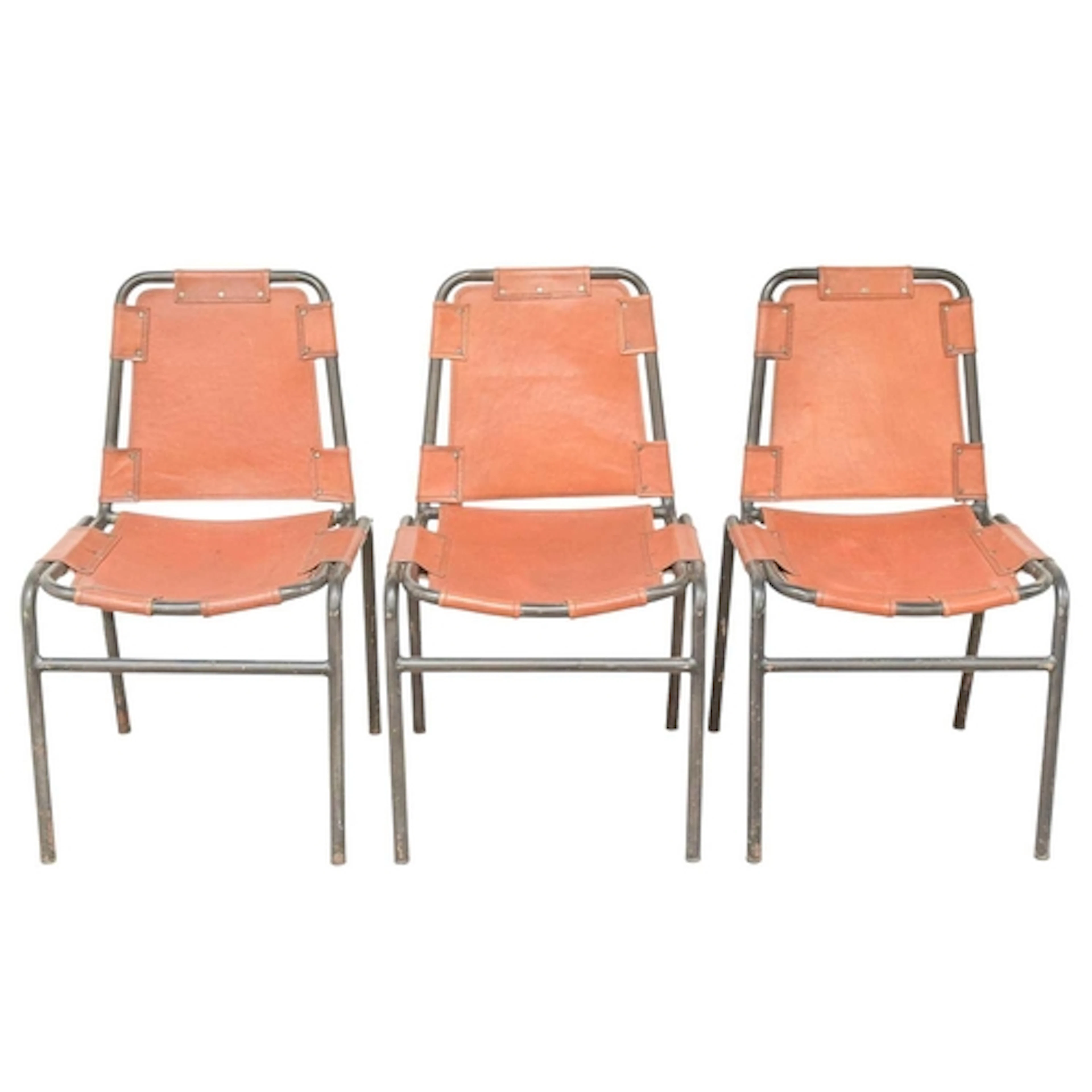 After Charlotte Perriand, three Les Arcs style dining chairs...