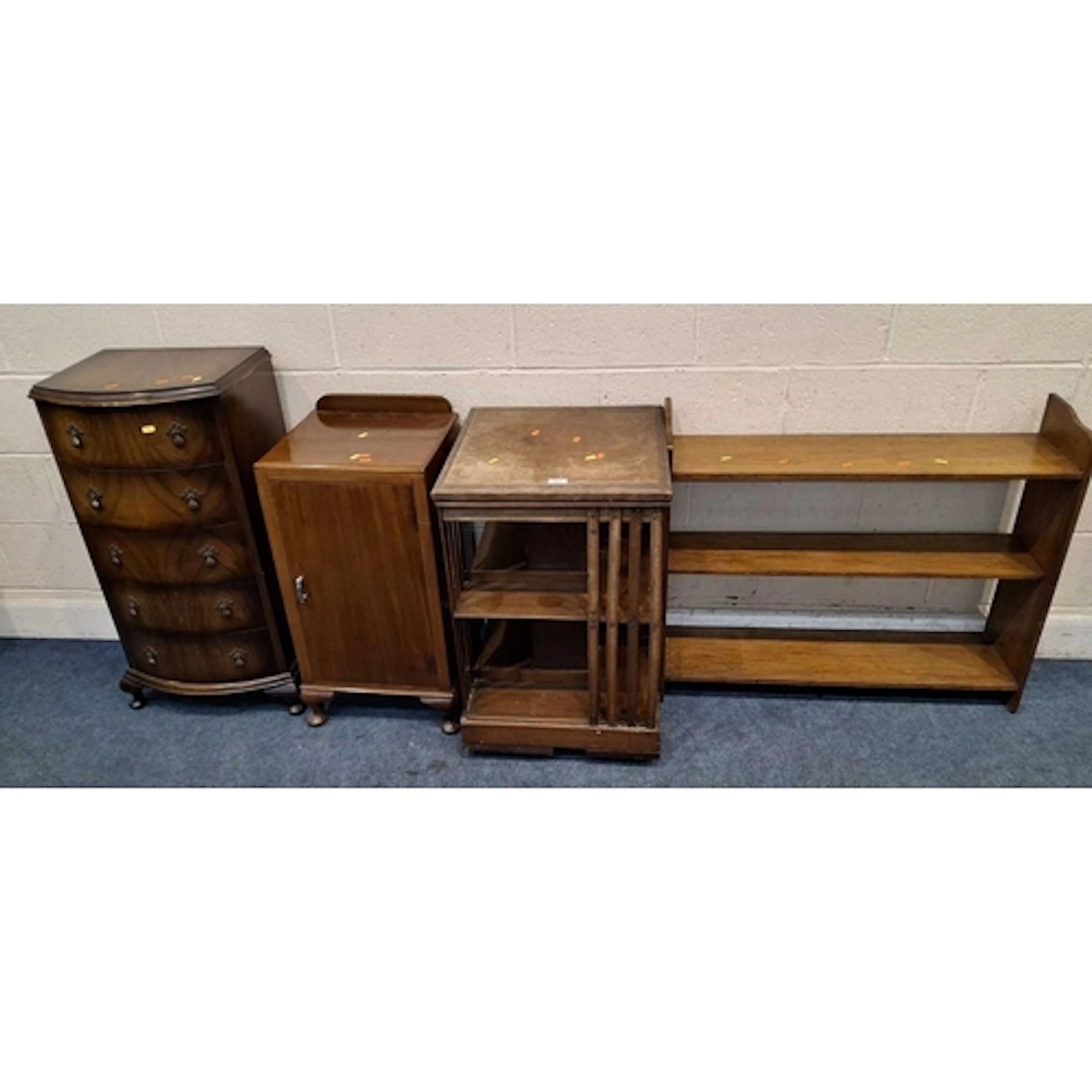 AN EARLY 20TH CENTURY OAK REVOLVING BOOKCASE, an open bookca...