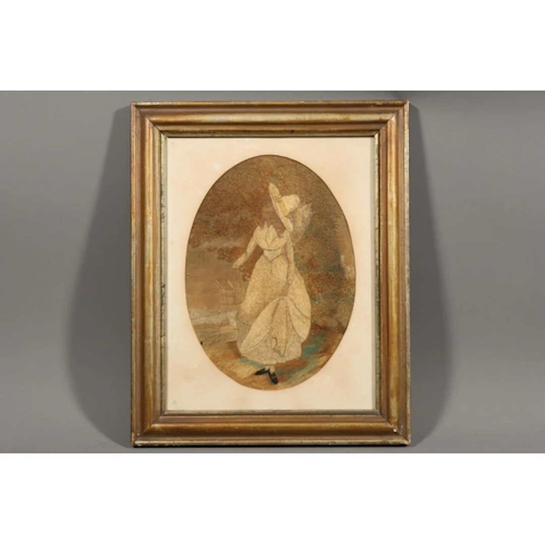 Late 18th or early 19th century needlework of lady holding p...