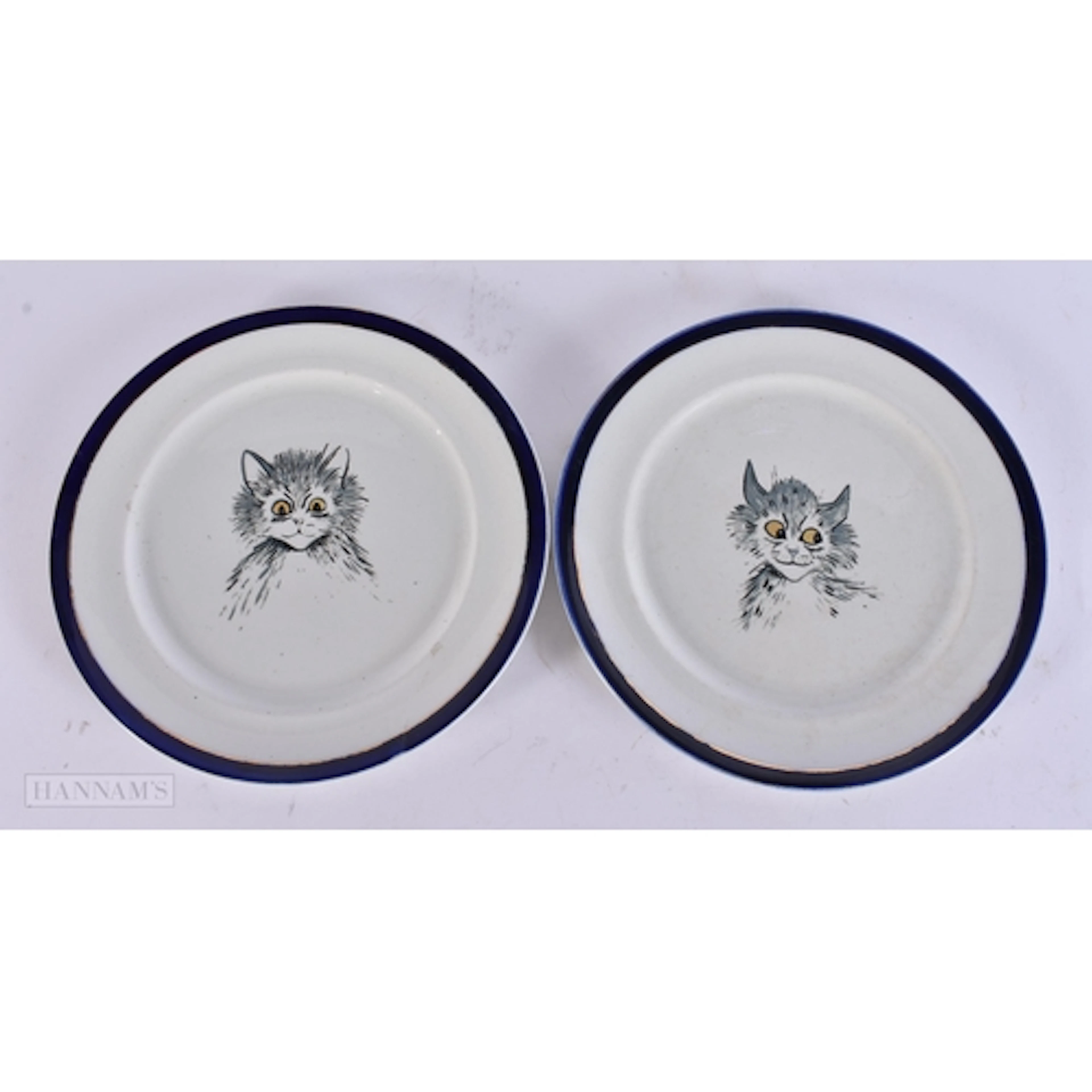 A PAIR OF VINTAGE LOUIS WAIN DESIGN CAT PLATES. 19 cm wide.