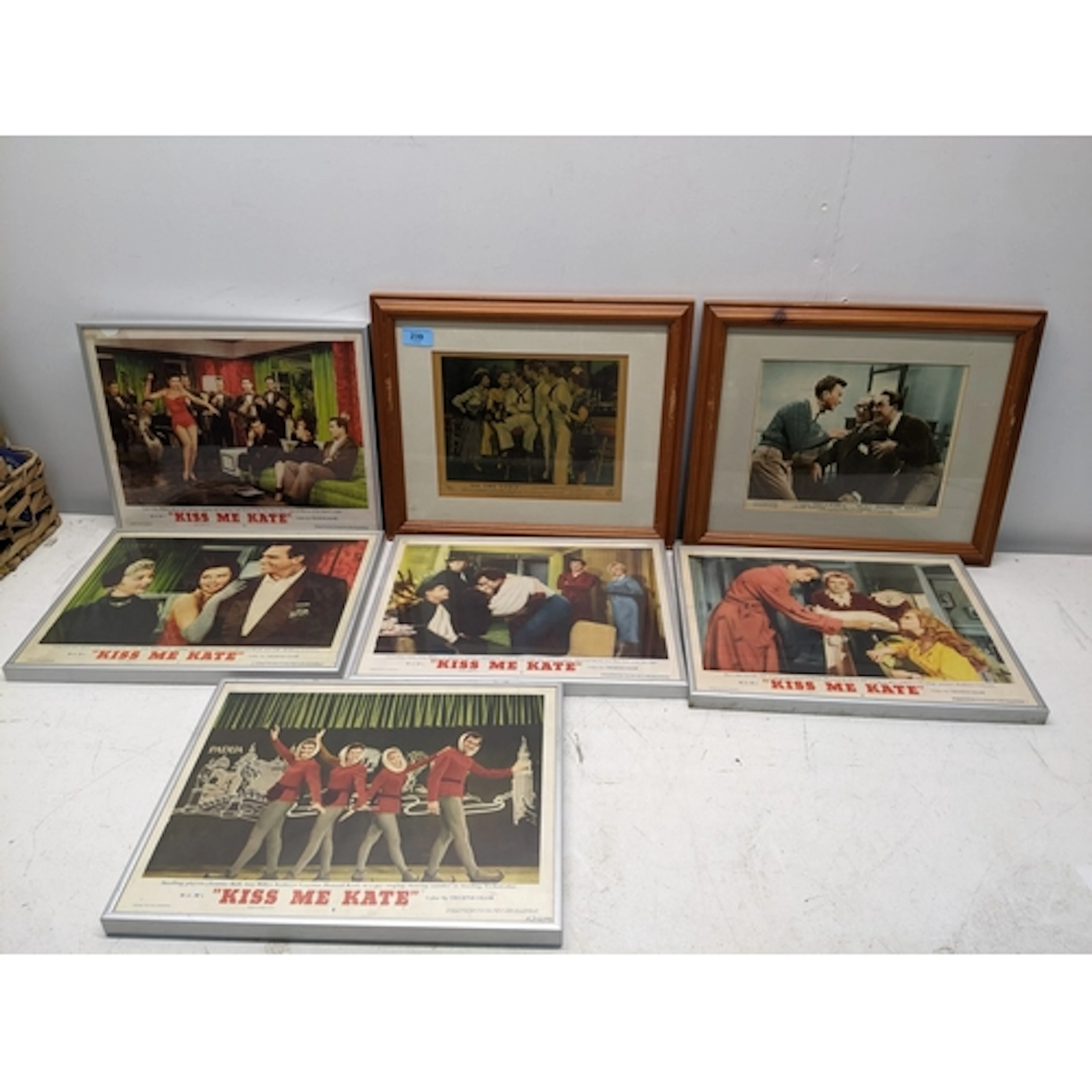 A group of five American lobby cards for the film 'Kiss Me K...