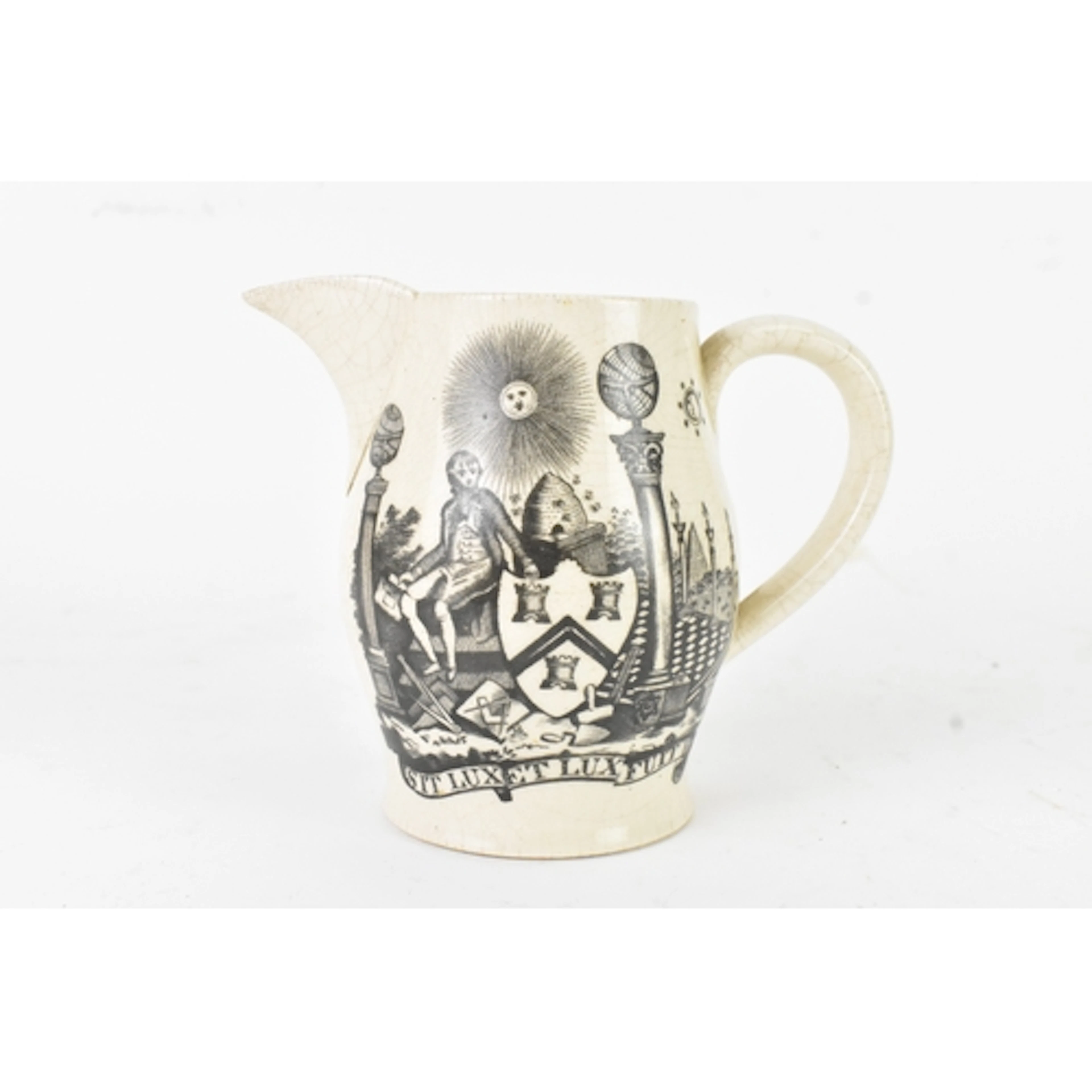 A19th century Masonic creamware jug, transfer-printed in bla...