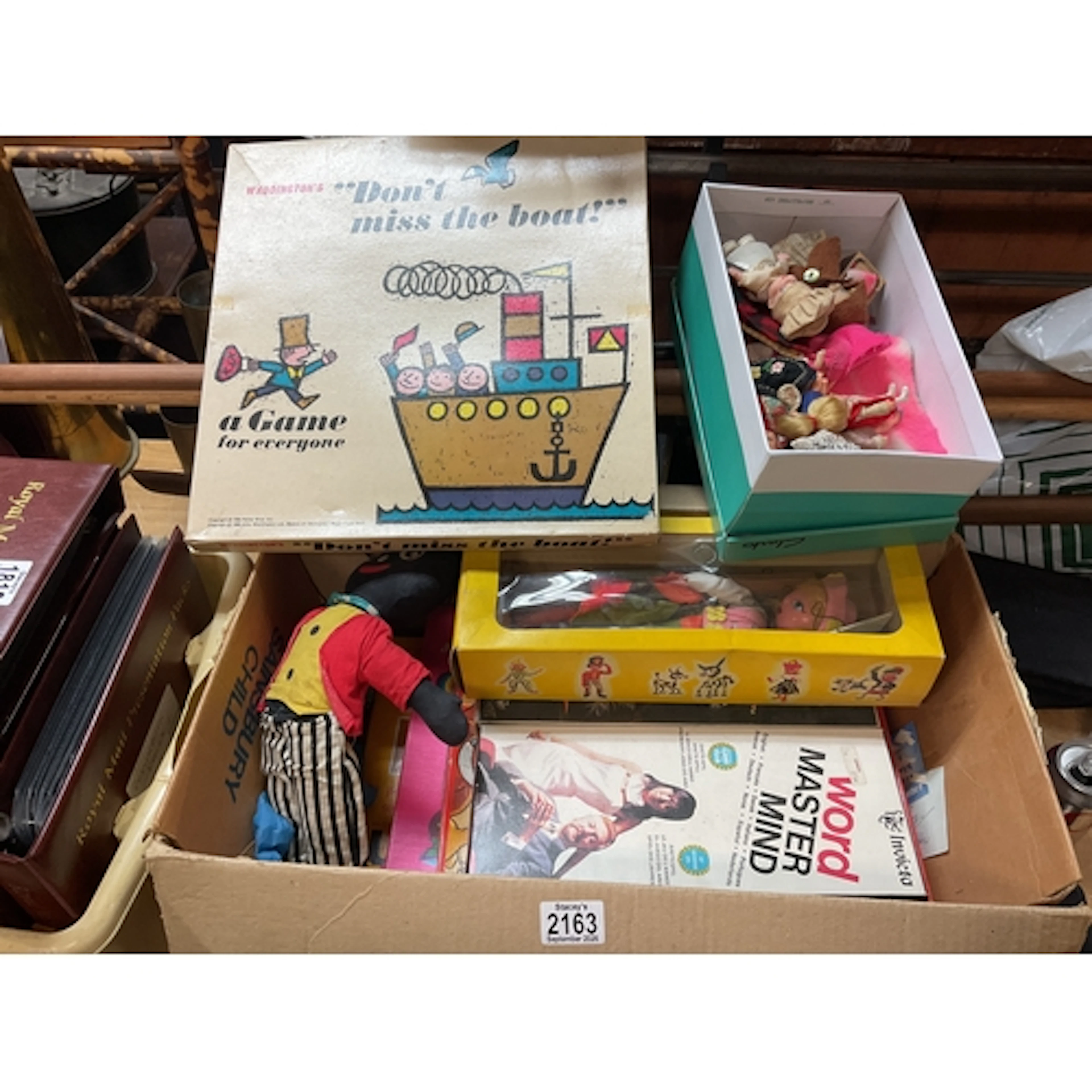 Box of vintage toys to inc board games, dollys, Pelham puppe...