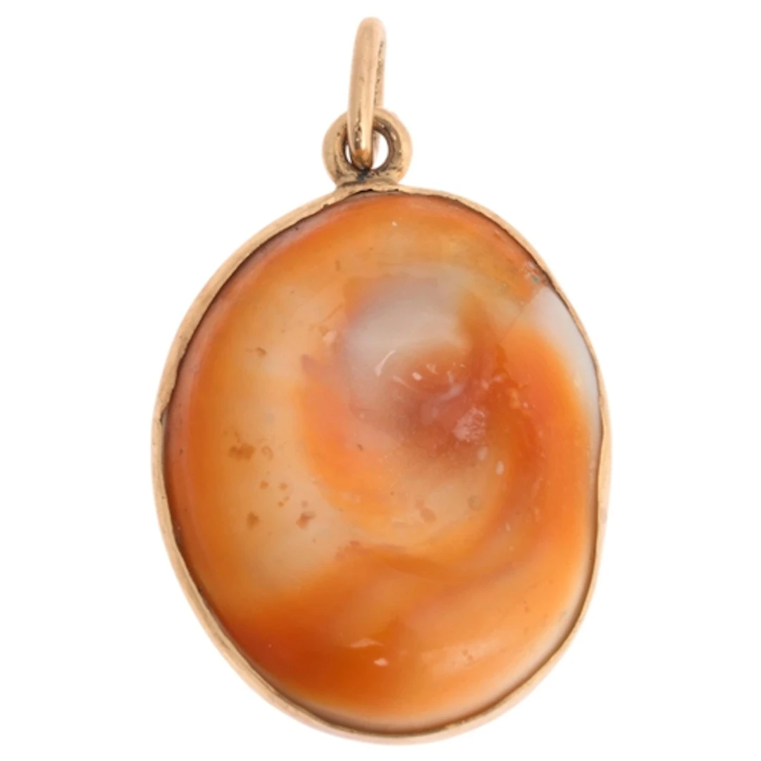 An Antique 'Eye Of Saint Lucia' shell pendant, circa 1900, t...