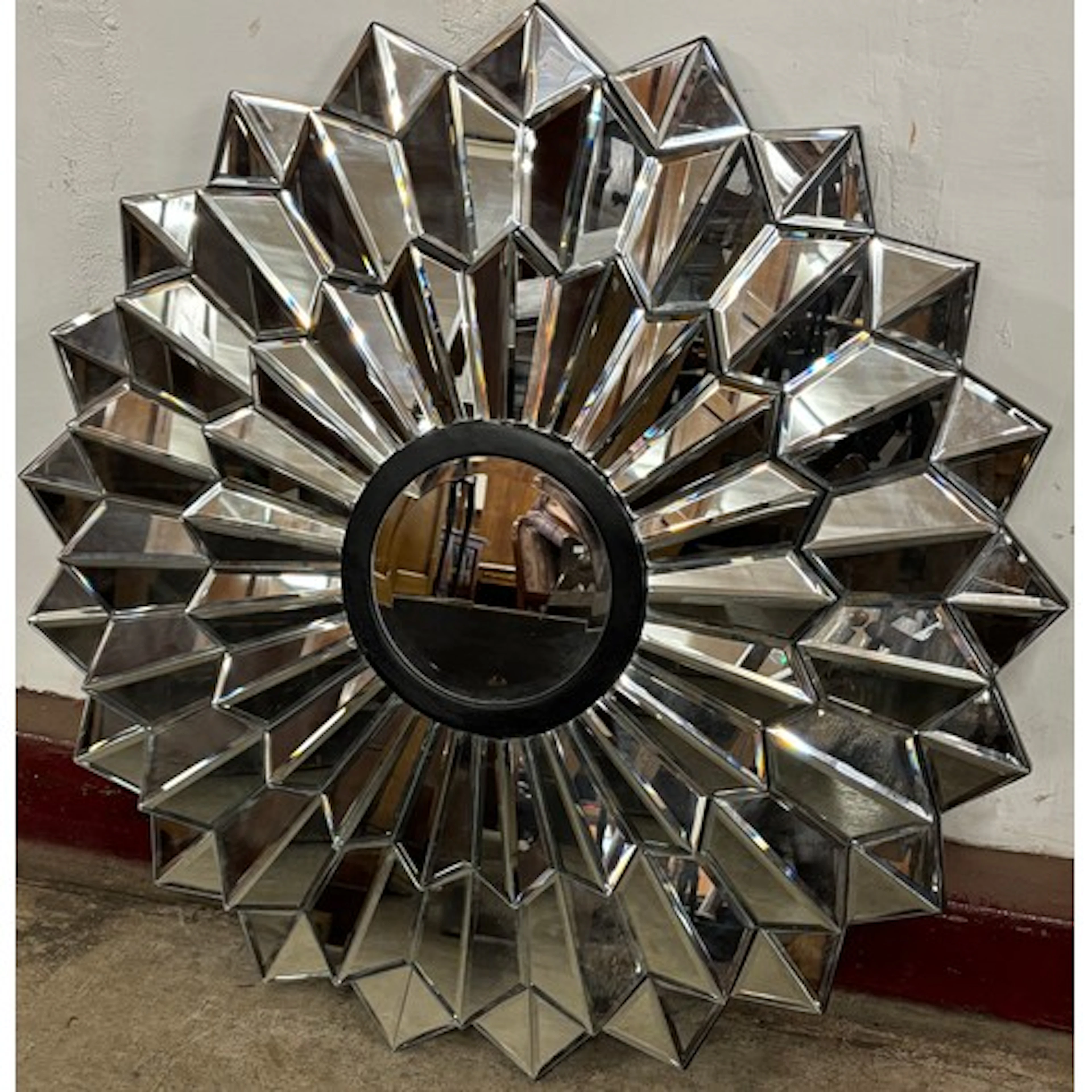 An Art Deco style glass sunburst mirror