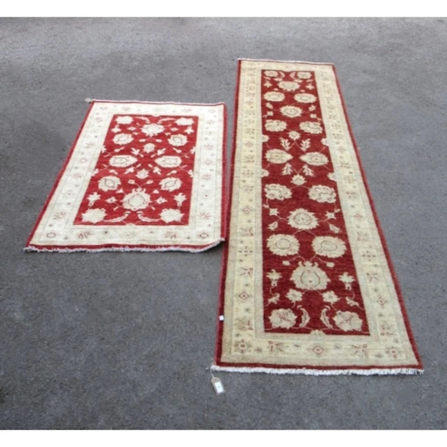 Indo-Persian runner, of Ziegler design, with a rust ground, ...