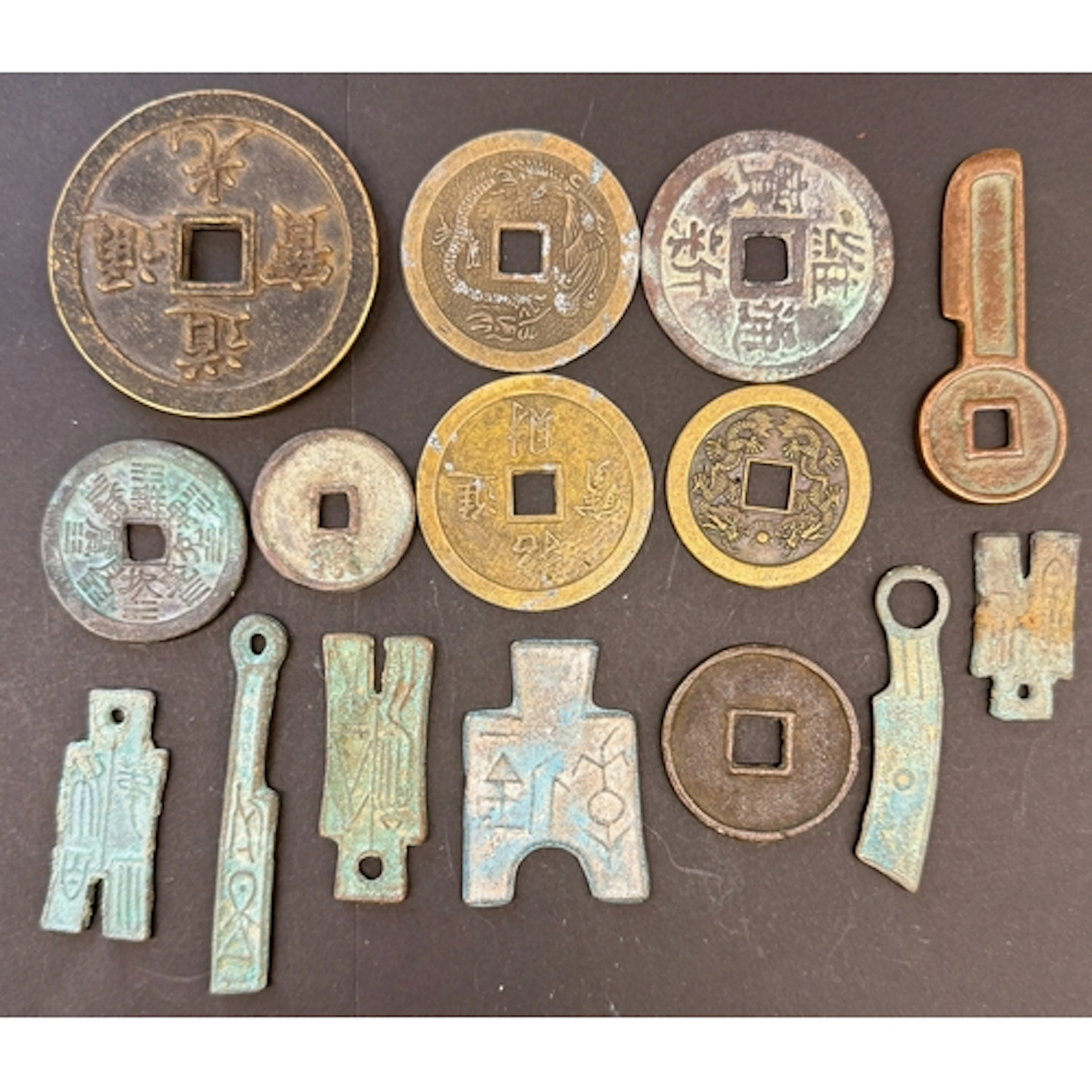 A group of x16 Chinese bronze pieces of ancient money type, ...