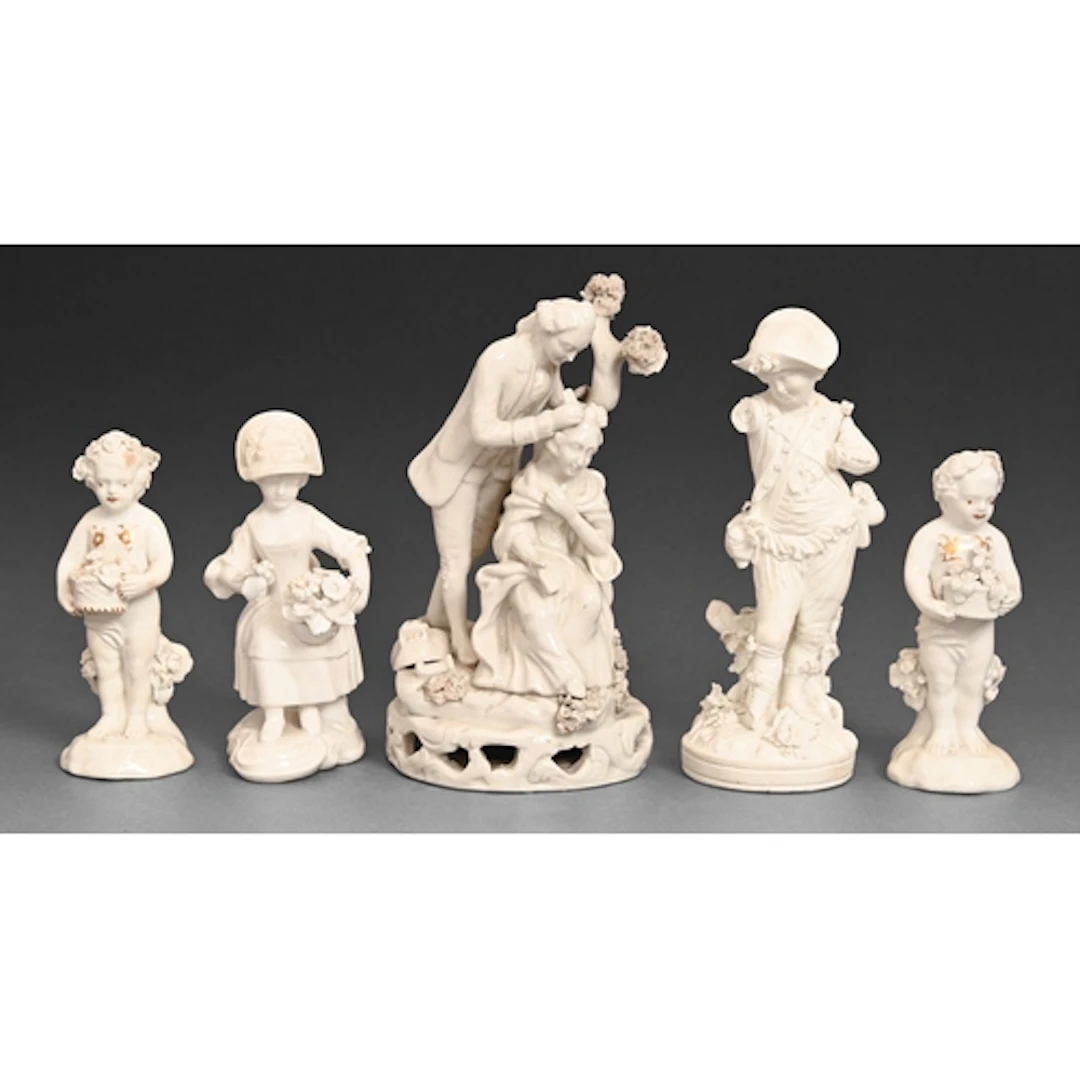 Two Derby white glazed figures of putti with flowers, late 1...