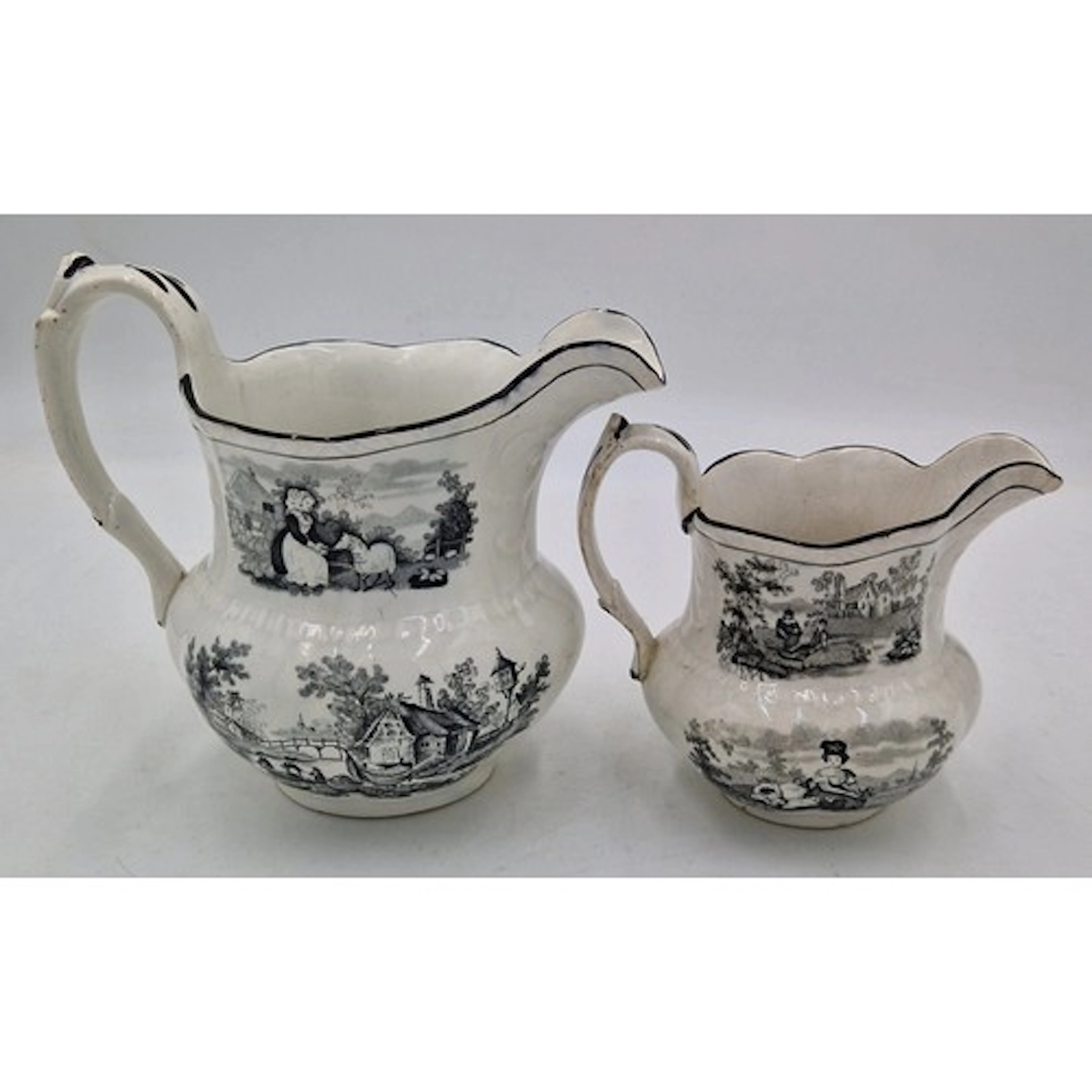 Two early 19th century black and white transfer printed Swan...