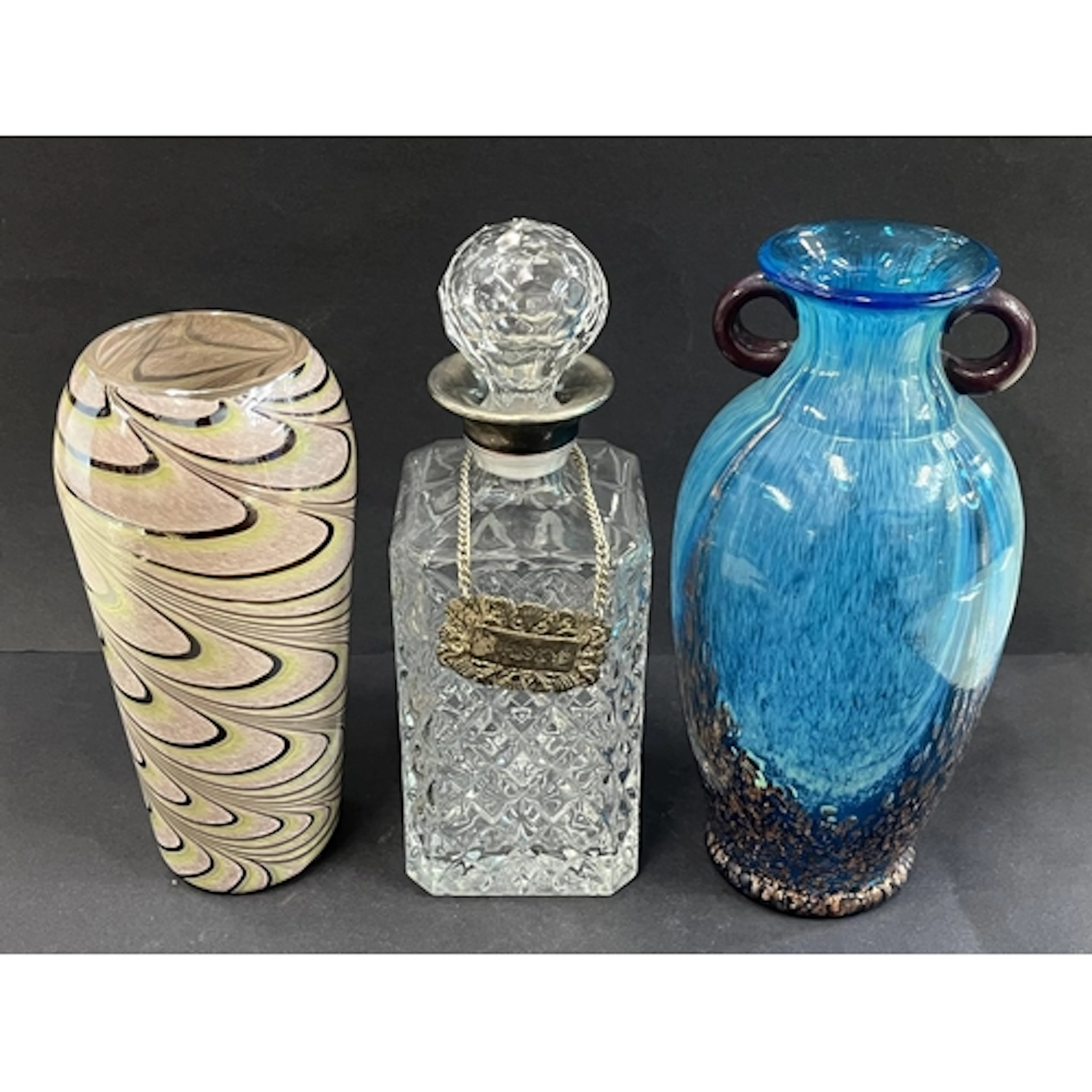 Cut-glass square section decanter with silver plated rim and...