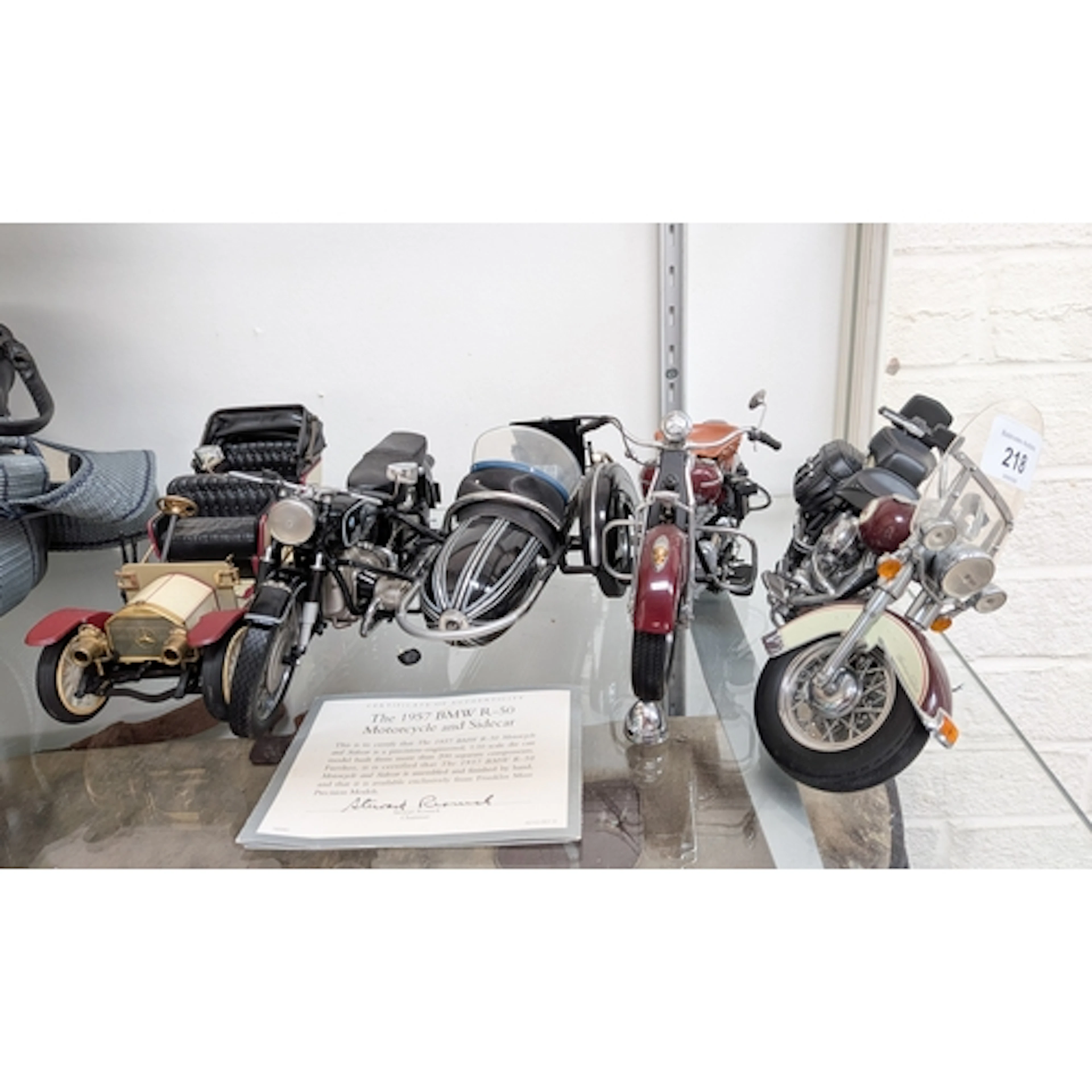 A Franklin Mint precision model 1957 BMW R-50 motorcycle and...