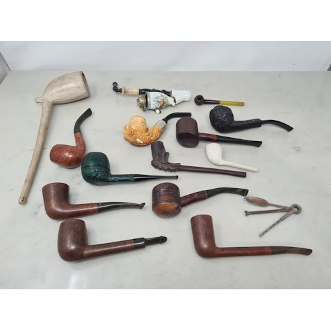 A large clay Pipe by W White, Glasgow, a continental porcela...