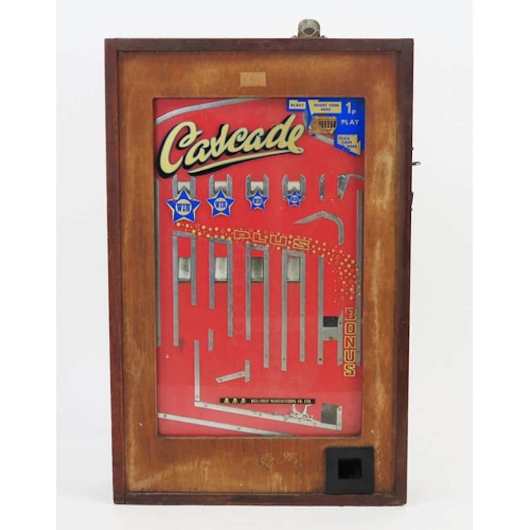 A Bell-Fruit "Cascade" wall mounted penny arcade slot machin...