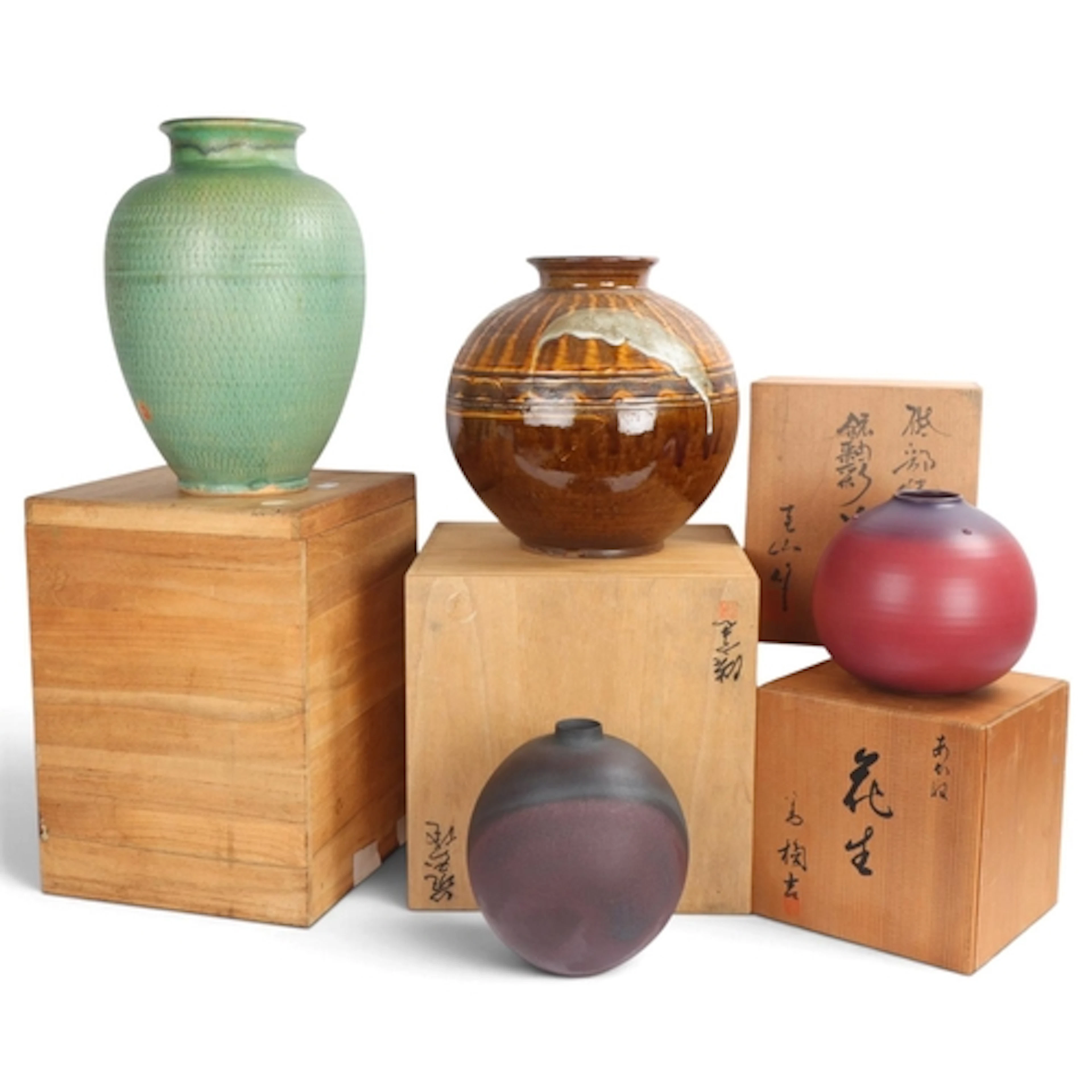 4 Japanese studio ceramic vases, all in individual wooden bo...