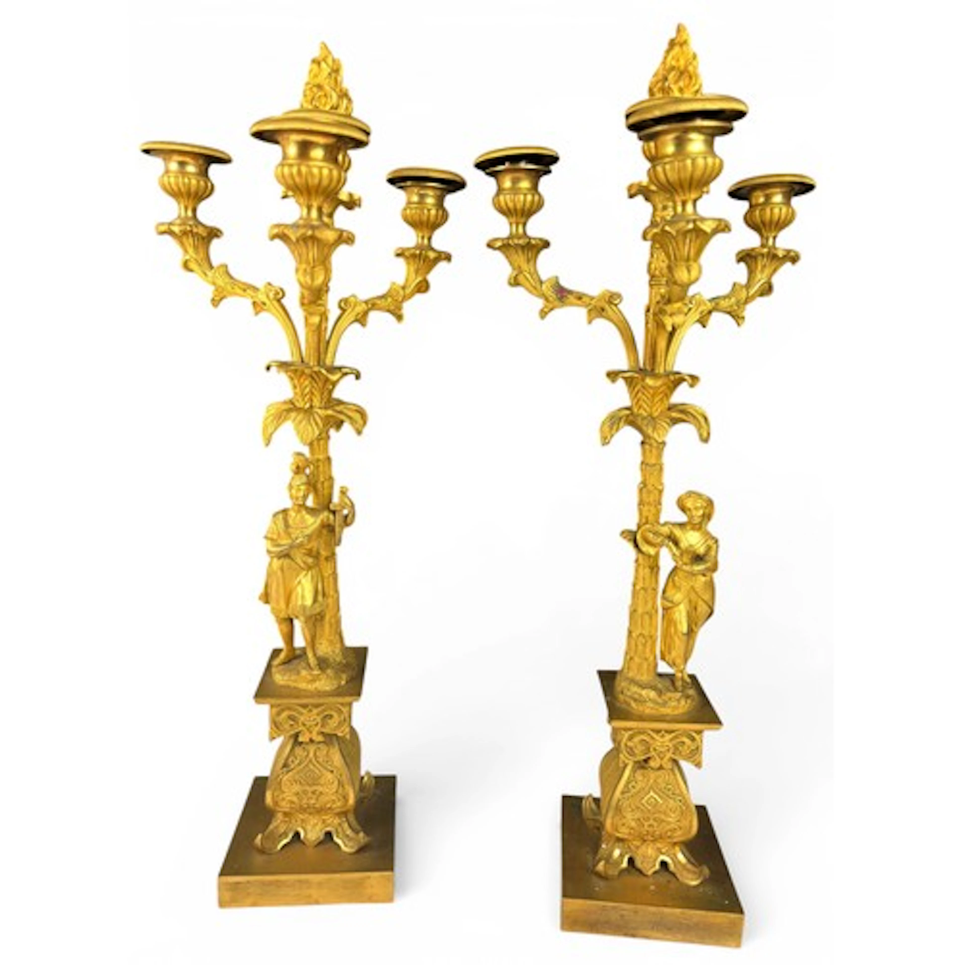 A pair of early 19th century ormolu four light candelabra, i...