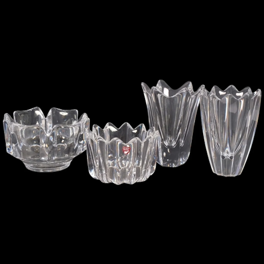 A group of Orrefors glass vases, including "Belle", a tulip ...
