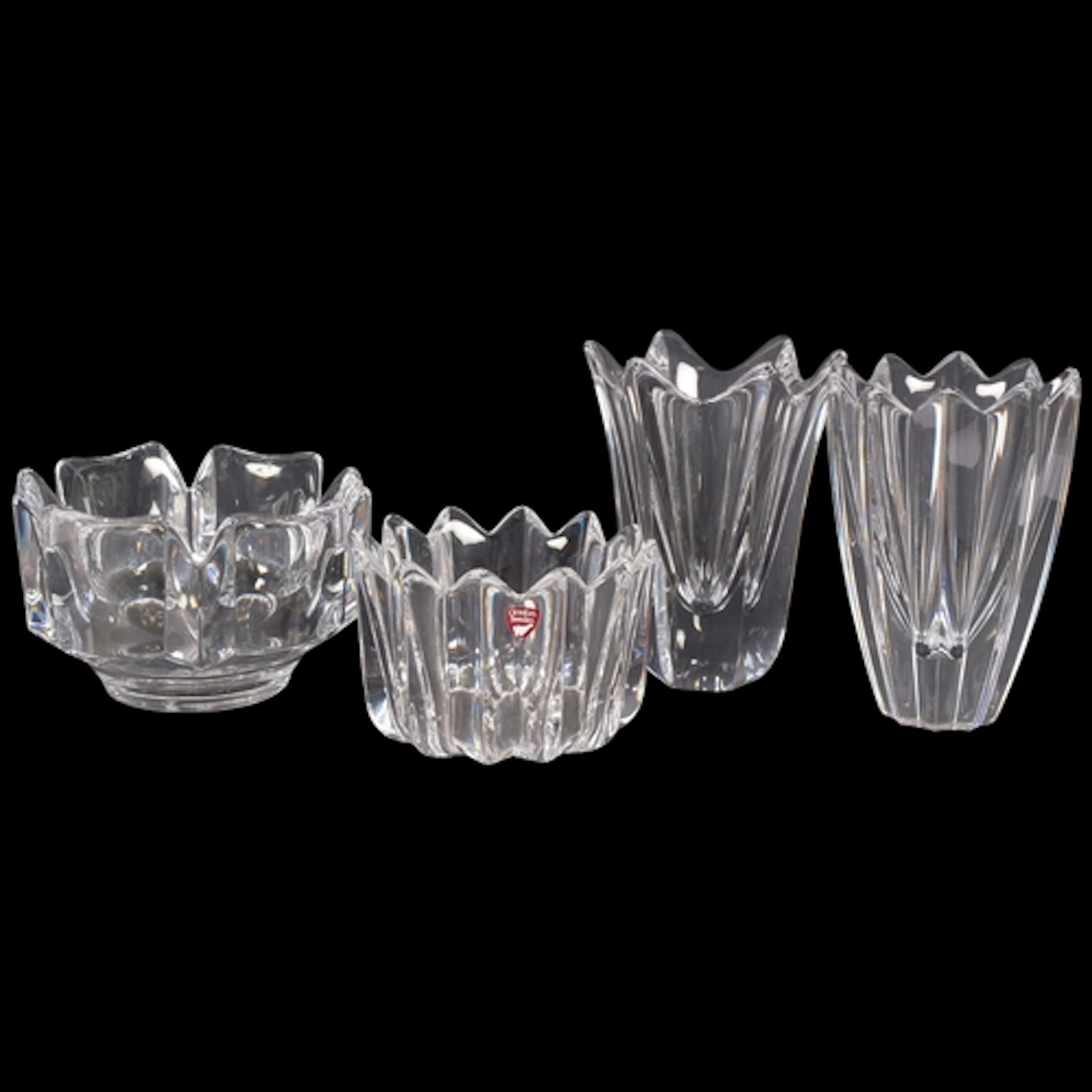 A group of Orrefors glass vases, including "Belle", a tulip ...
