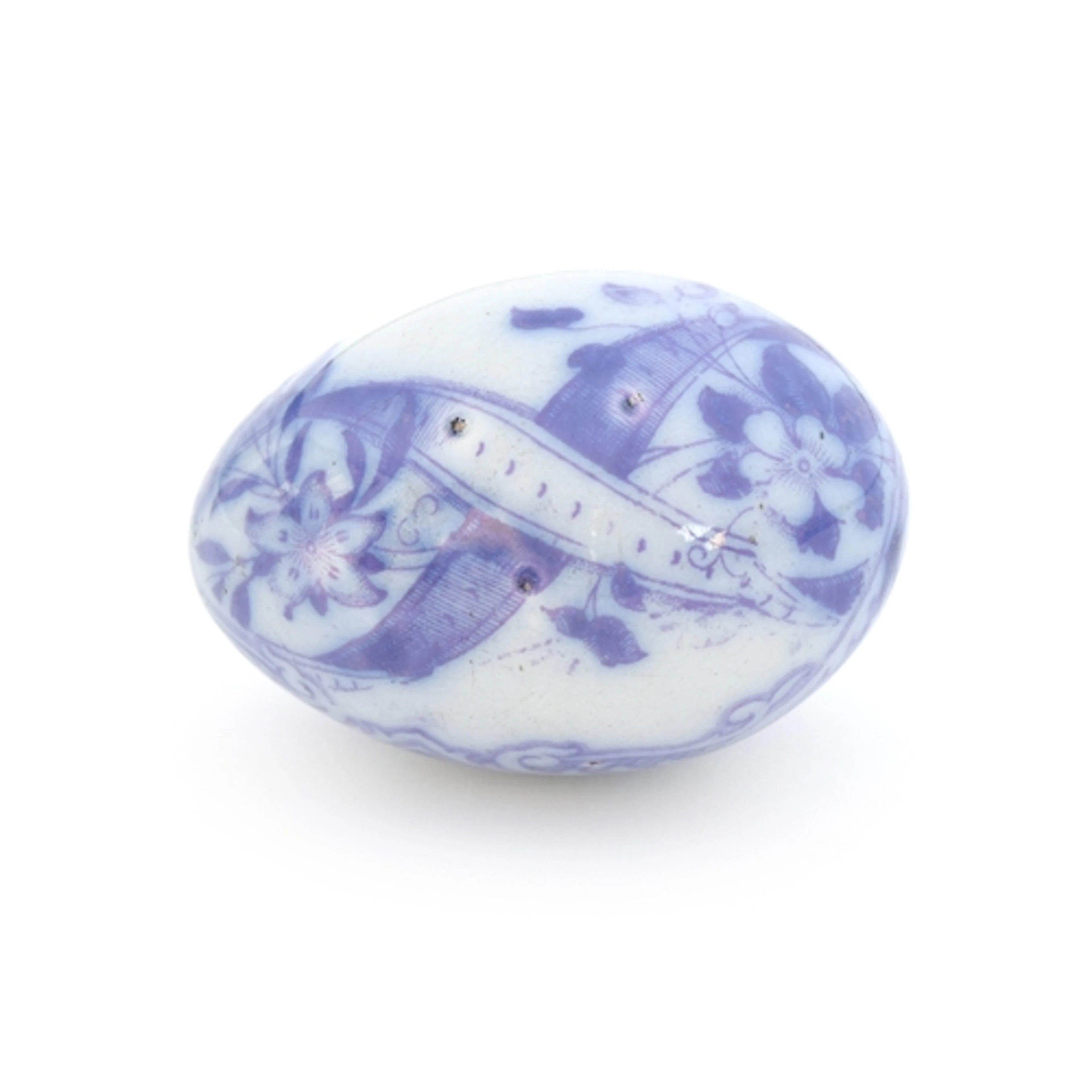 A 19th century Staffordshire or Whitehaven Pottery darning o...