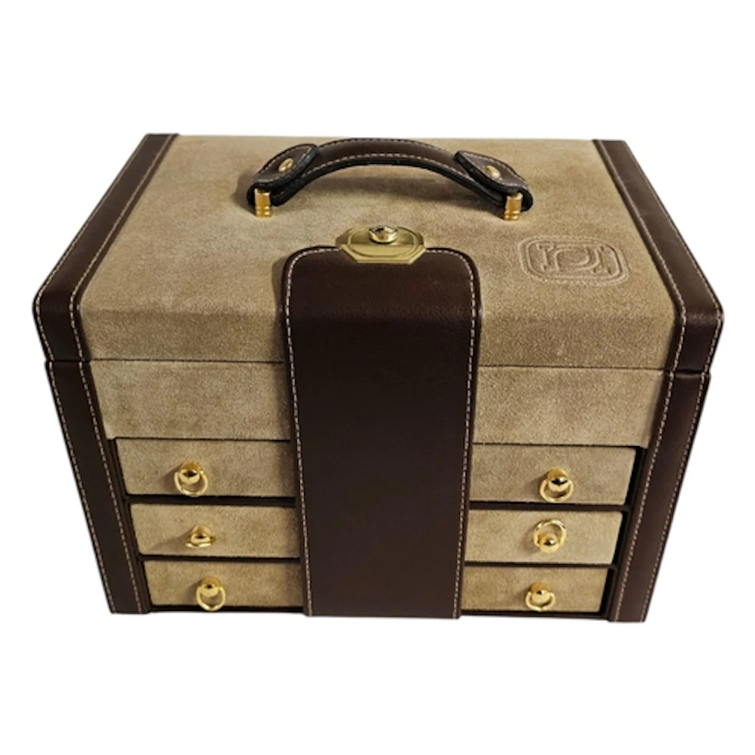 A VINTAGE BROWN LEATHER AND SUEDE JEWELLERY BOX Single carry...