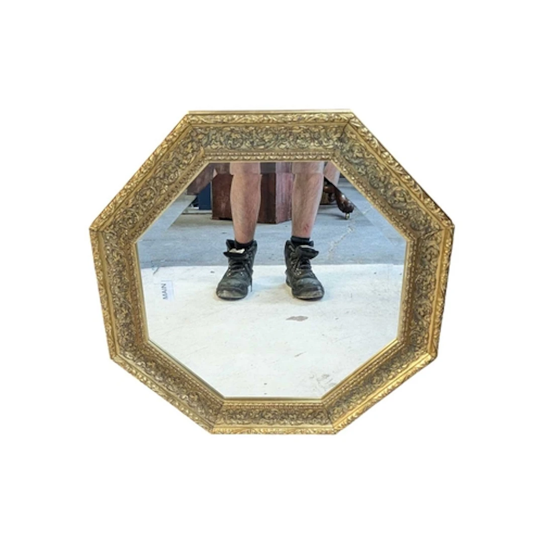 Gilt wood octagonal bevelled edge wall mirror. Accompanied b...