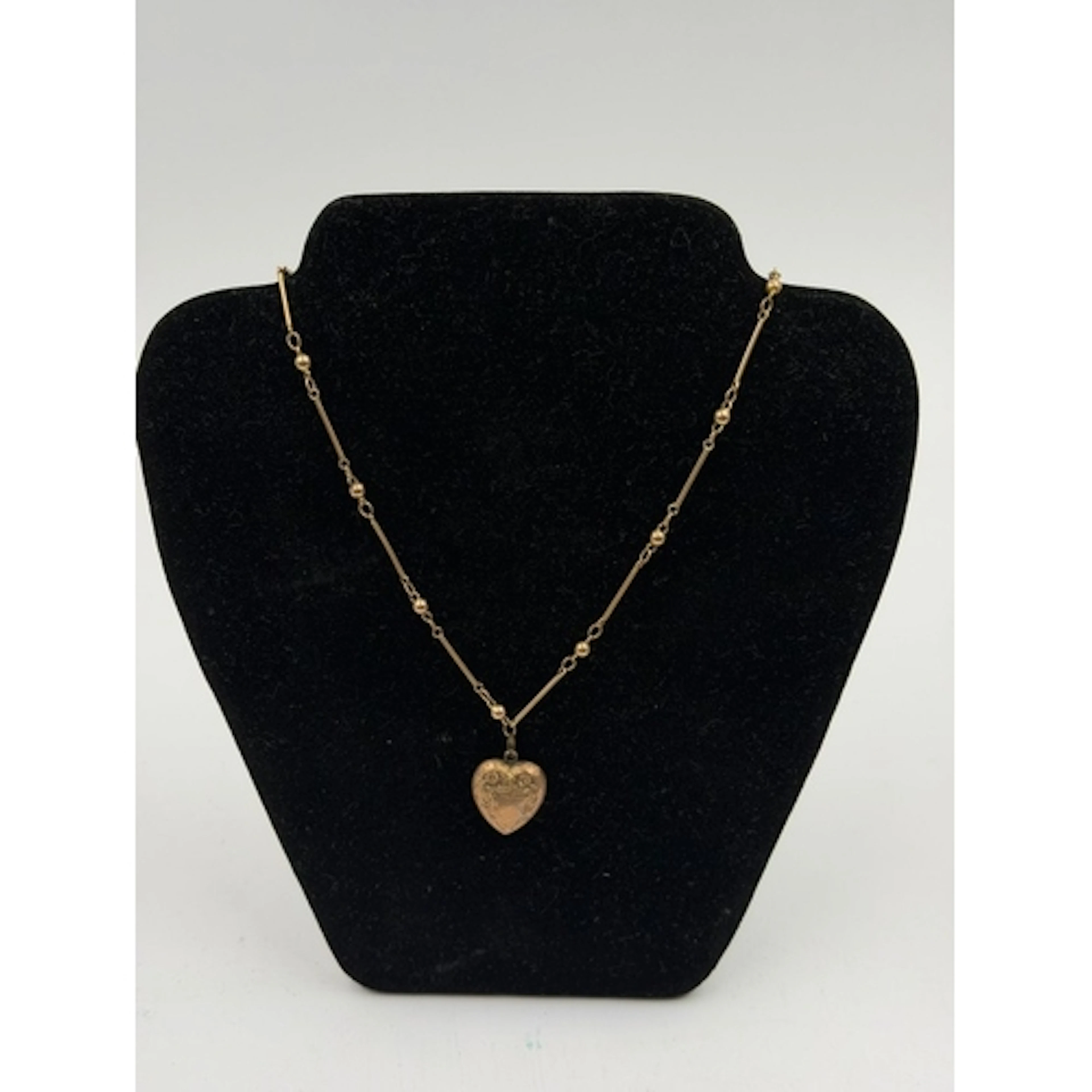 An AF gold heart pendant and necklace with steel replacement...
