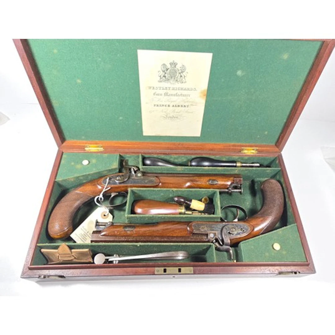 An extremely fine pair of officer's cased 16 bore percussion...