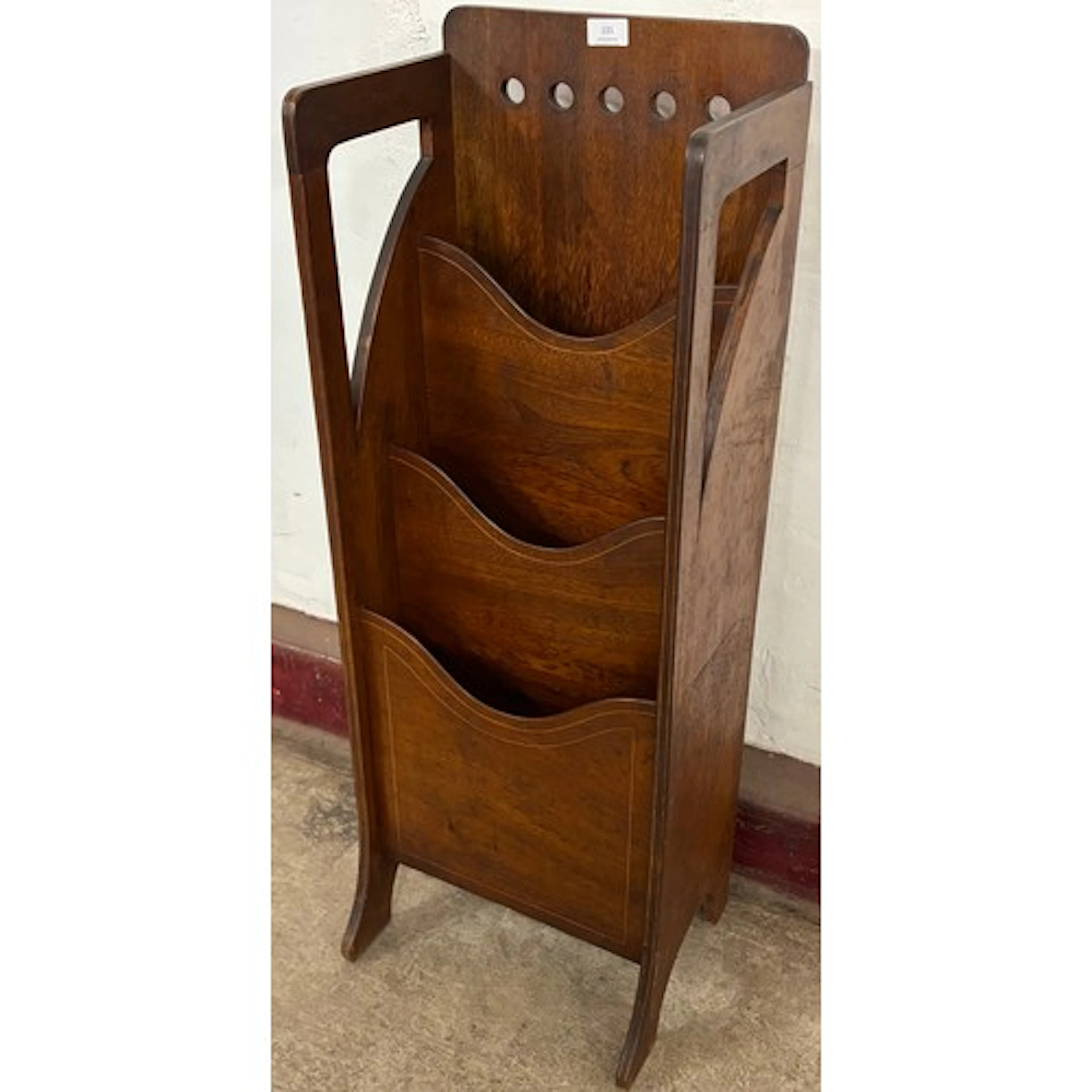 A Scottish Glasgow School Arts & Crafts oak magazine rack