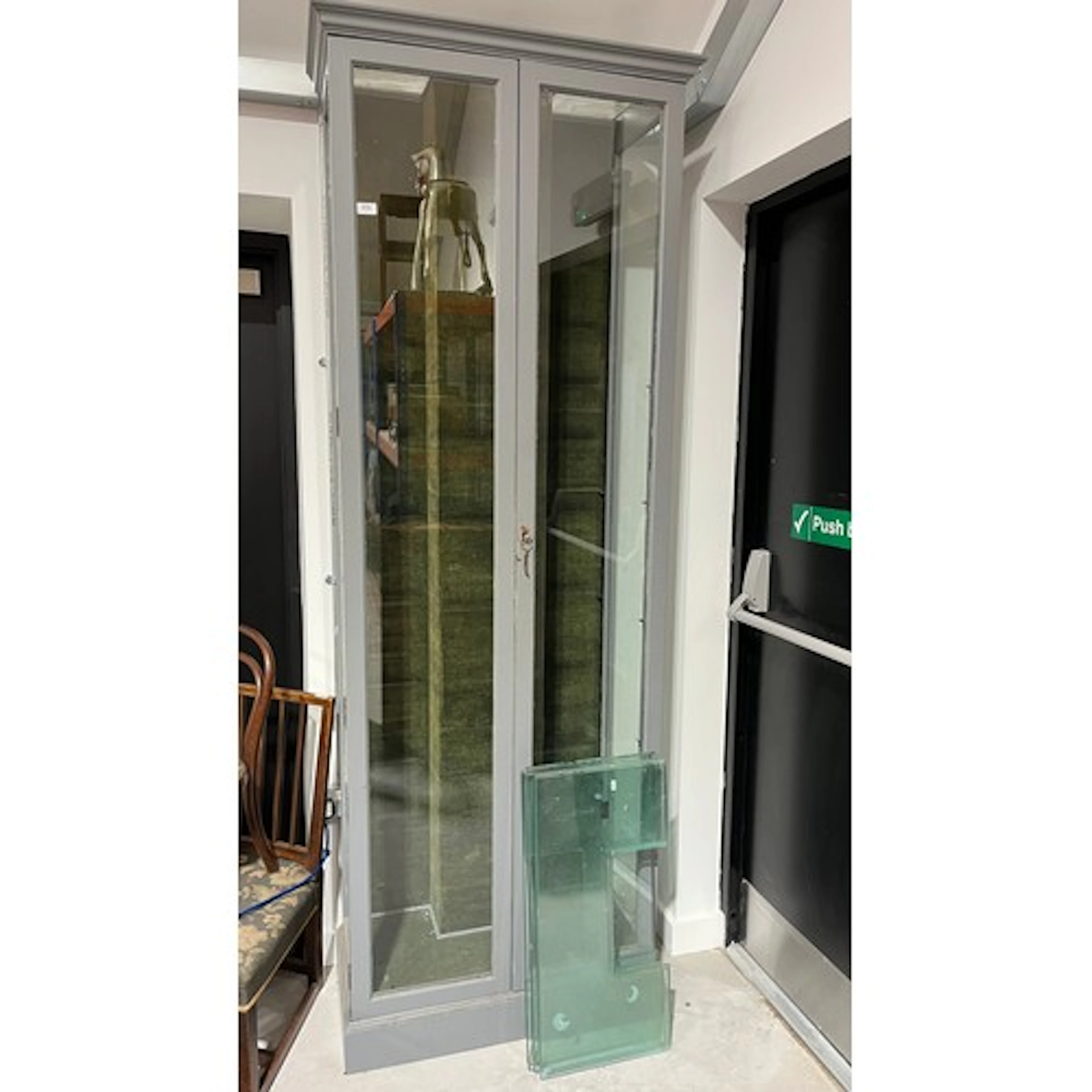 Large display cabinet with glass shelves