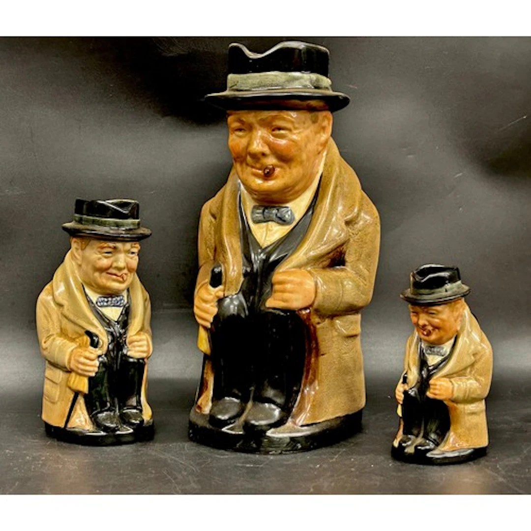 Three Royal Doulton graduating Winston Churchill character j...