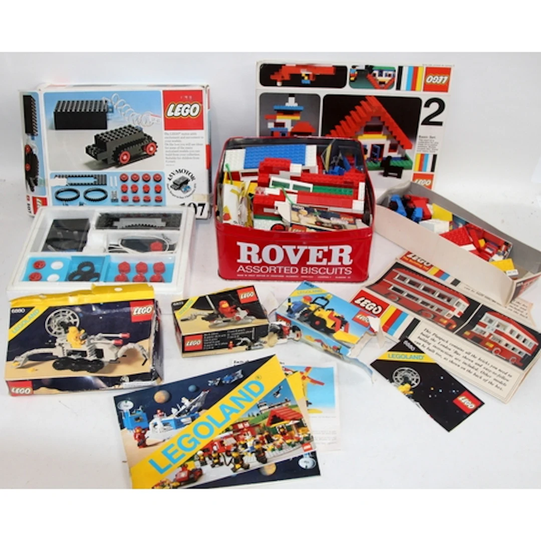 A collection of vintage Lego and Lego boxes, unknown if any ...