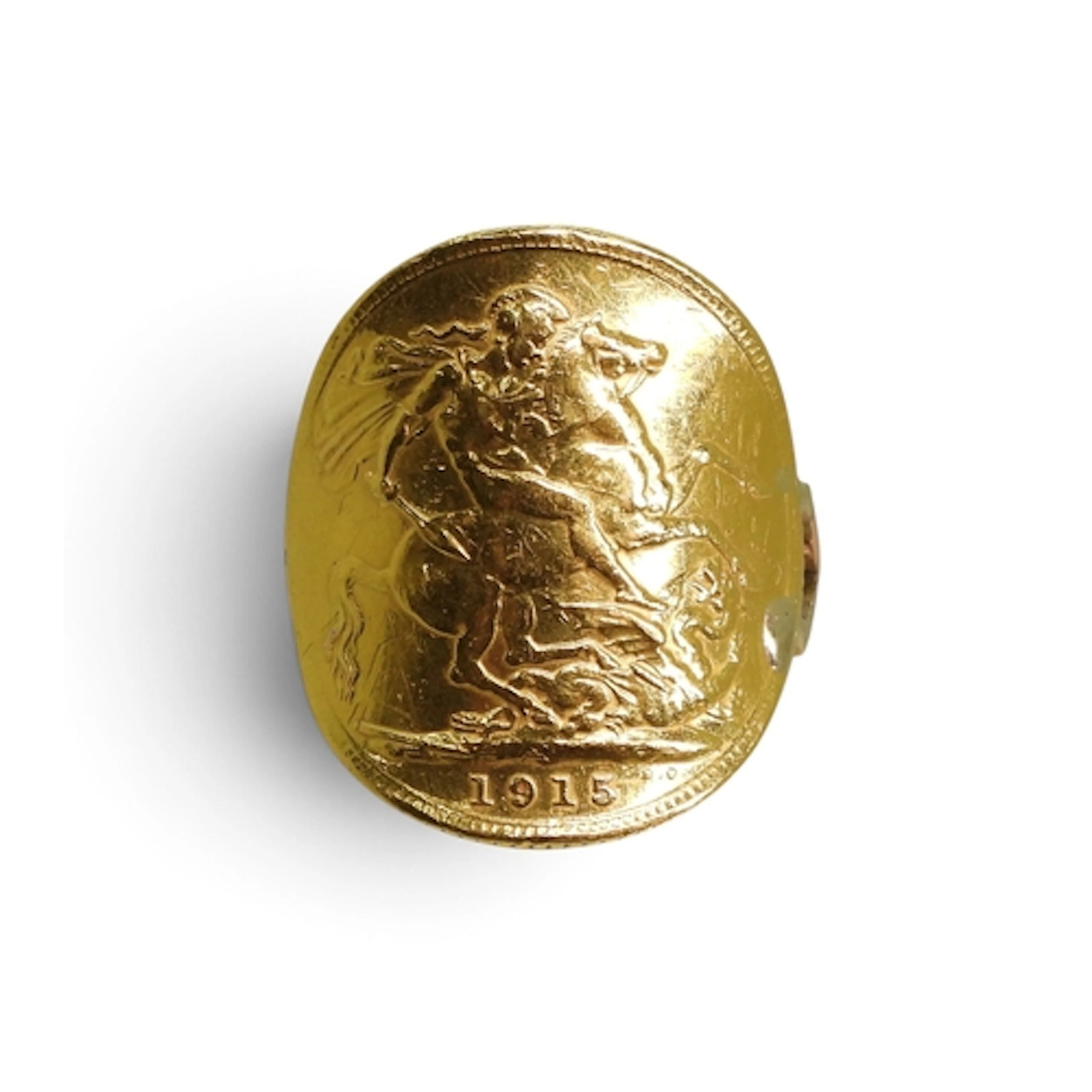 A 1915 full gold sovereign in a yellow metal soldered on rin...